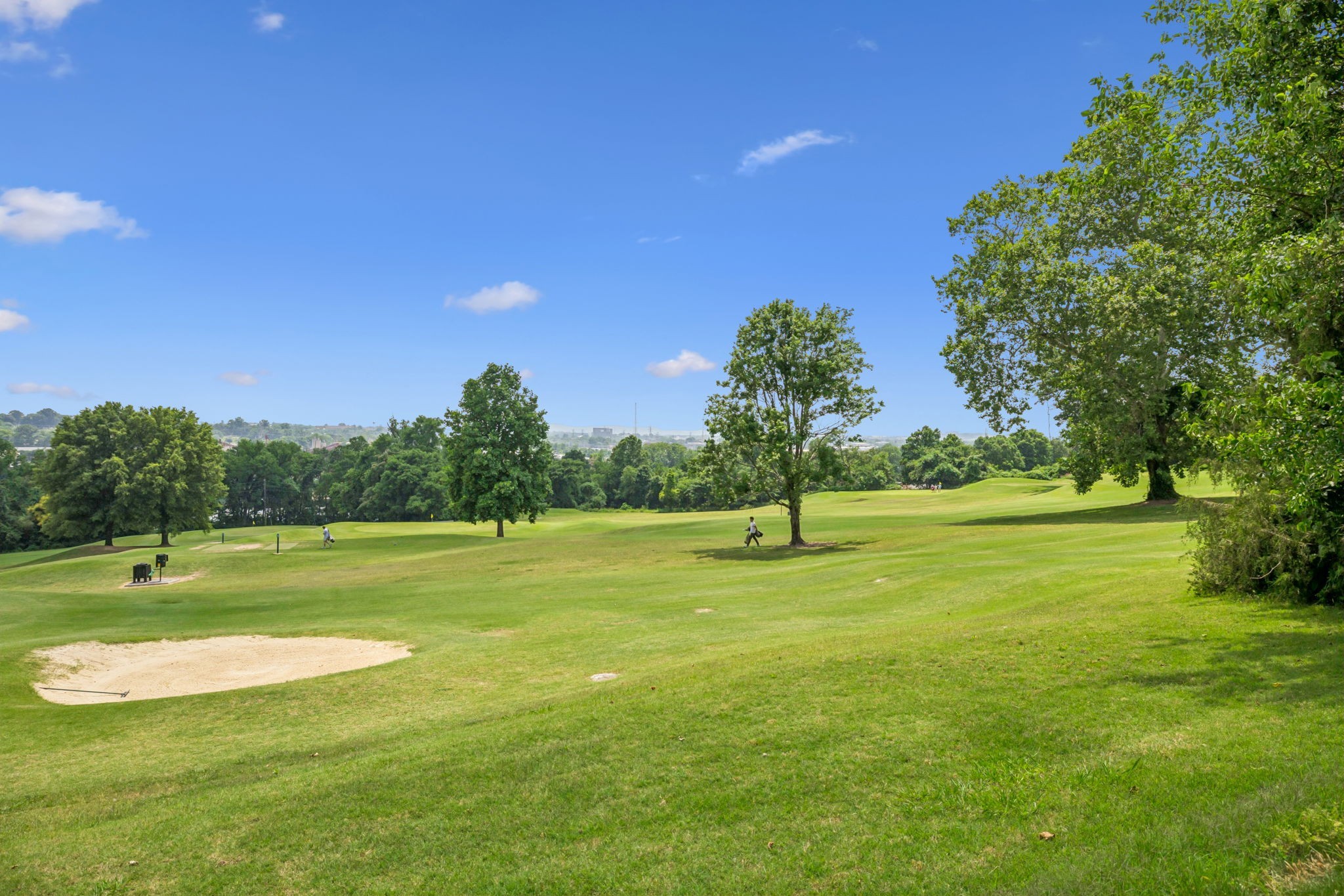 257 B Riverside Drive Nashville, TN 37206 - Photo 44 of 56 a view of a golf course with a lake
