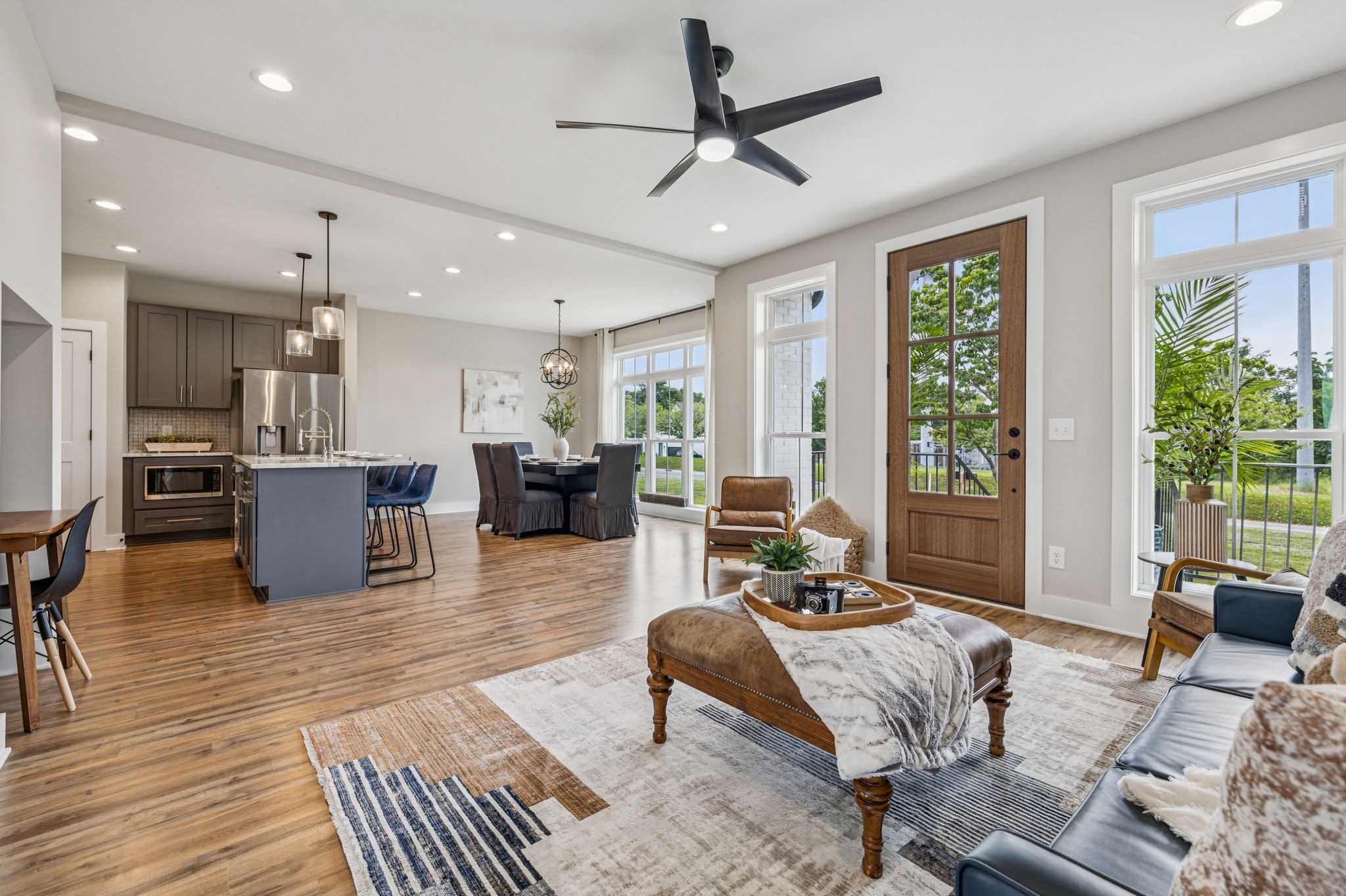 257 B Riverside Drive Nashville, TN 37206 - Photo 9 of 56 a living room with furniture wooden floor and a large window