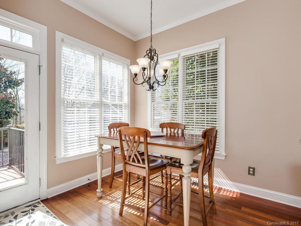 1940 Clark Elliot Street Fort Mill, SC 29708 - Photo 10 of 22 a view of a dining room with furniture and windows