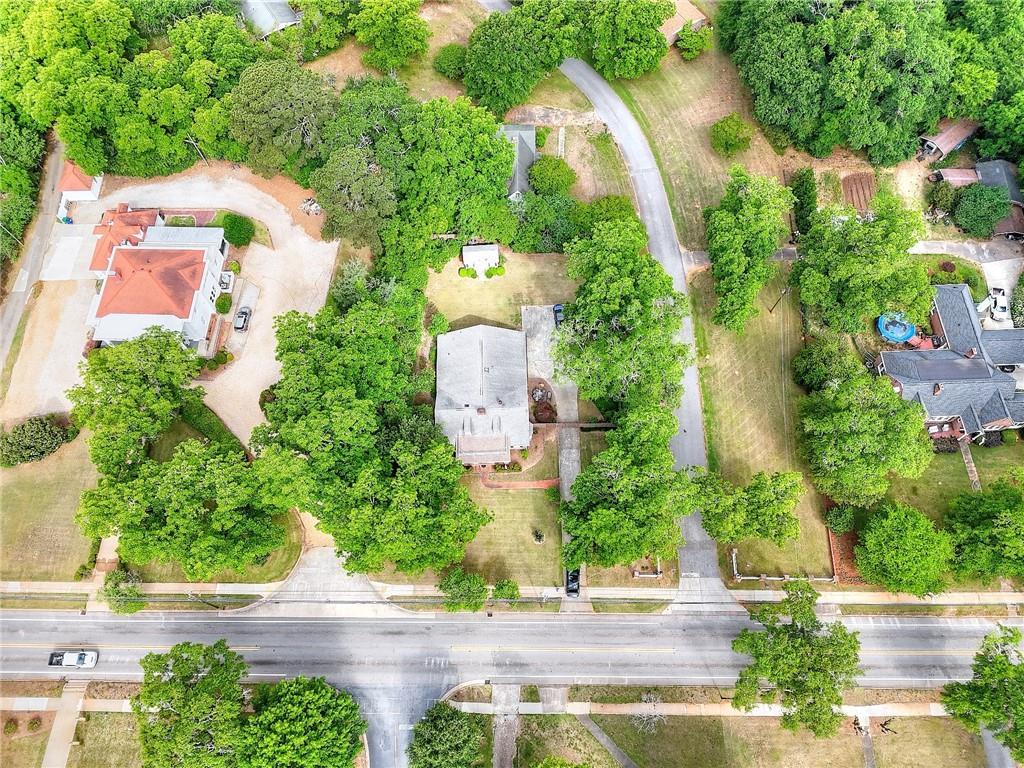 317 North Cherokee Road Social Circle, GA 30025 - Photo 28 of 32 an aerial view of a house with yard and parking