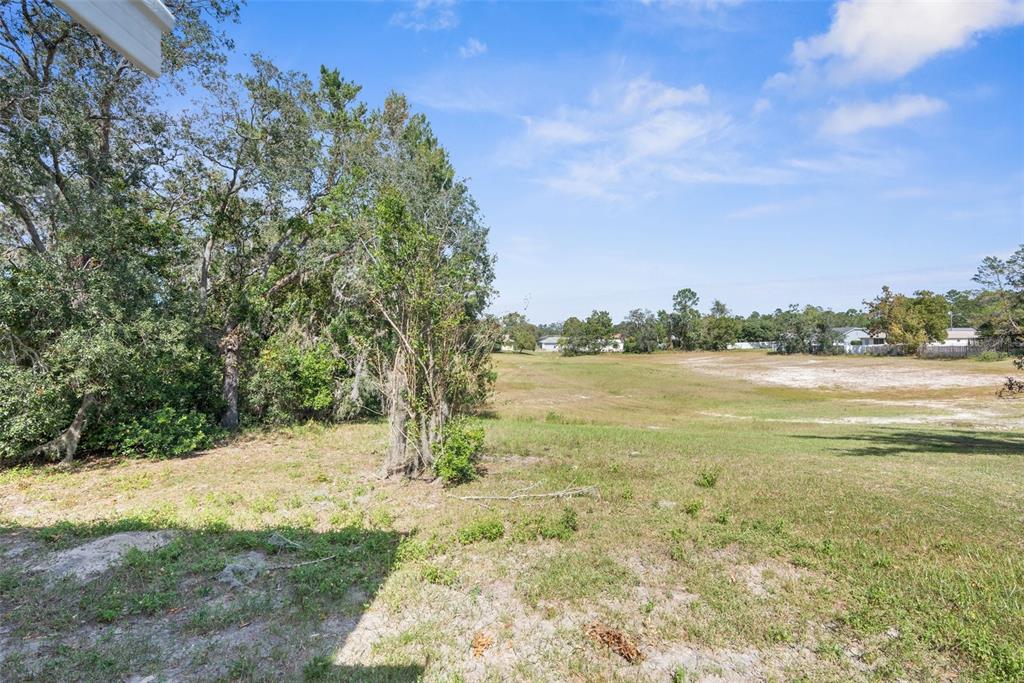 10221 Elgin Boulevard Spring Hill, FL 34608 - Photo 32 of 32 a view of lake with city view