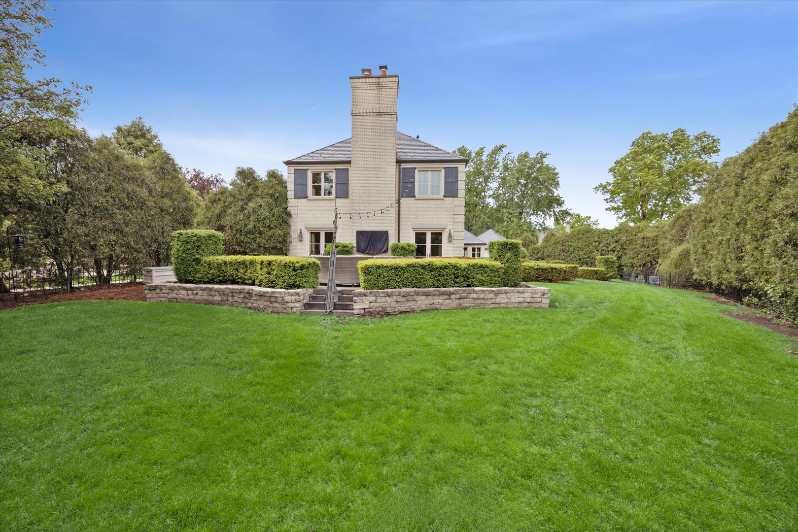 325 Princeton Road Hinsdale, IL 60521 - Photo 43 of 55 a front view of a house with a yard