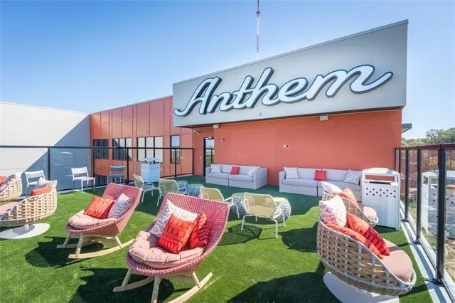 a front view of a building with swimming pool