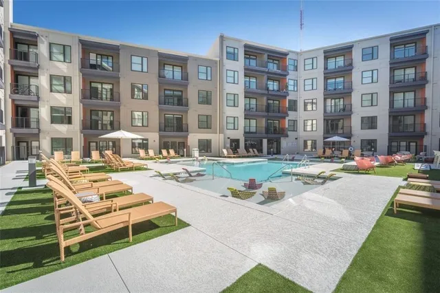 a outdoor space with patio the couches and potted plants