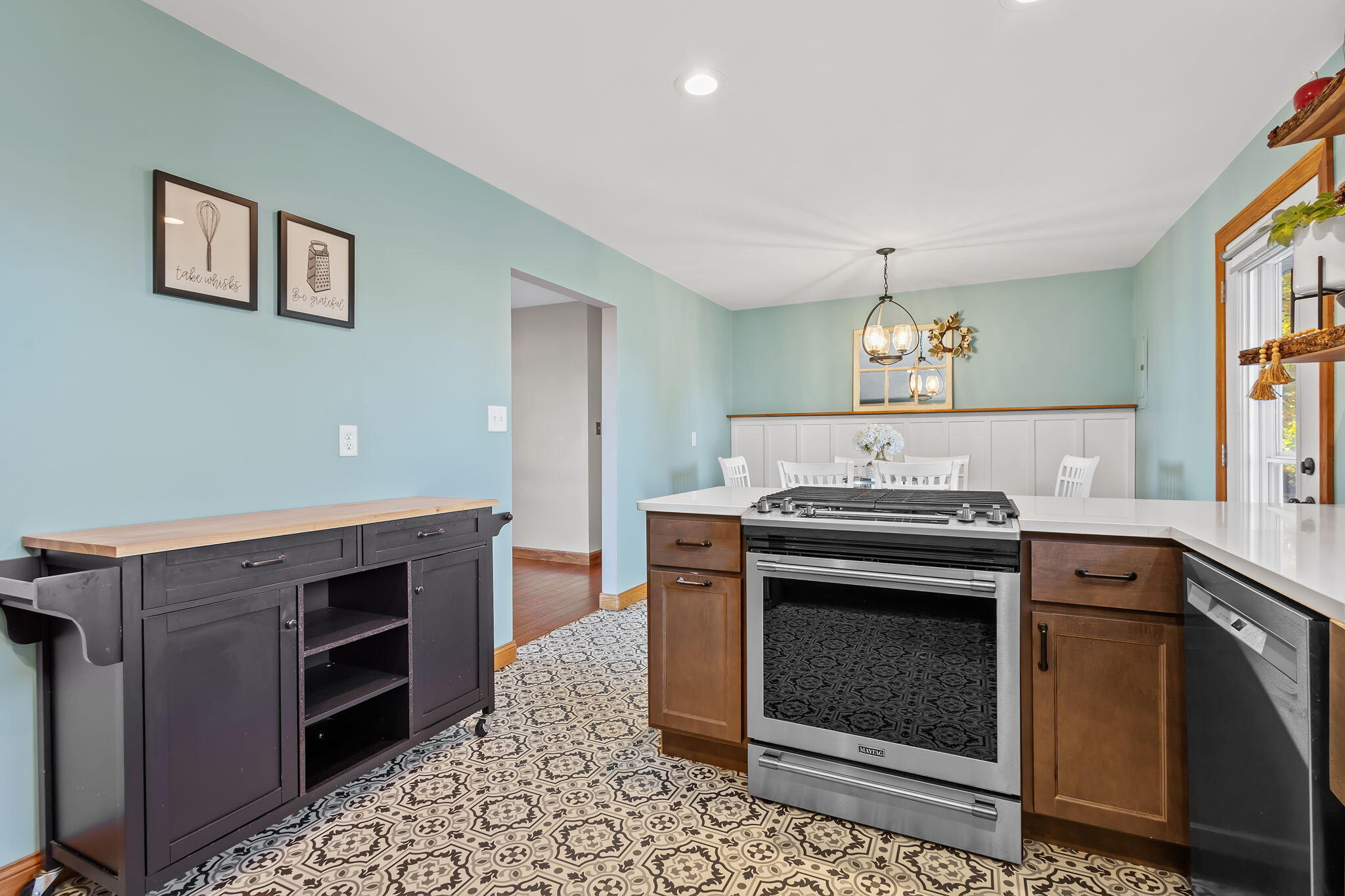 530 South 300 East Kouts, IN 46347 - Photo 13 of 42 a kitchen with a stove and a sink