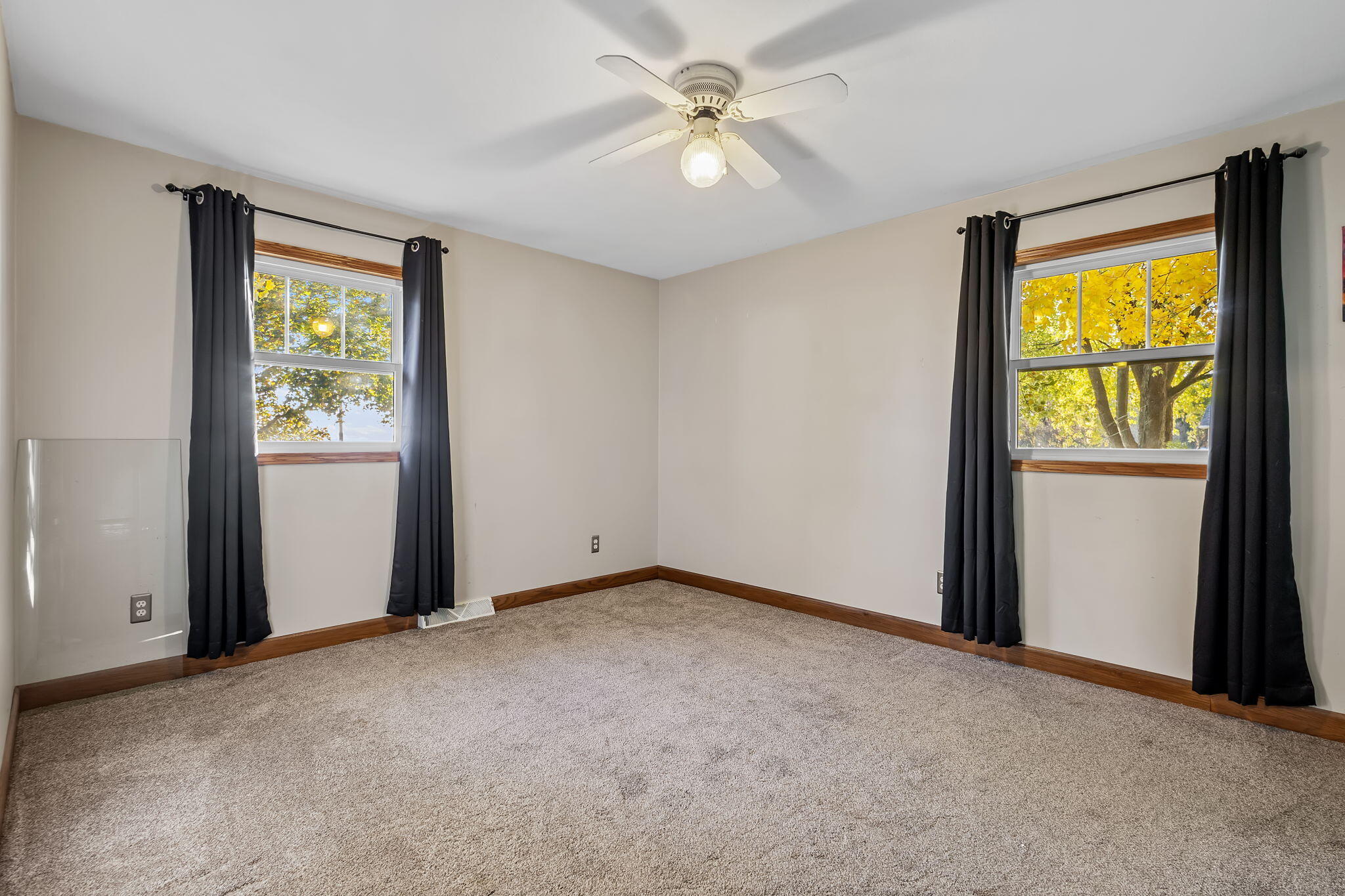 530 South 300 East Kouts, IN 46347 - Photo 17 of 42 an empty room with windows and closet