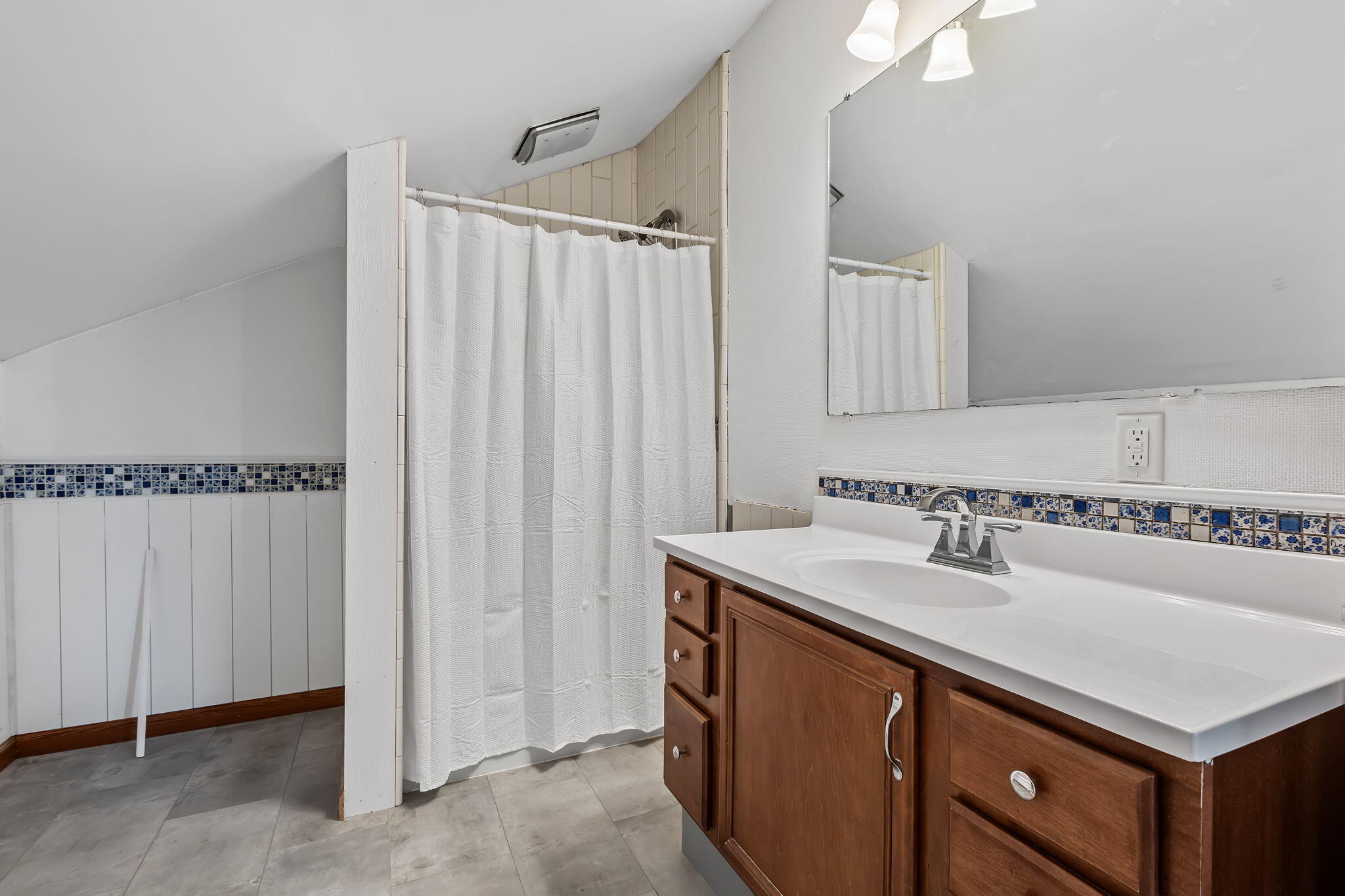 530 South 300 East Kouts, IN 46347 - Photo 24 of 42 a bathroom with a sink and a mirror