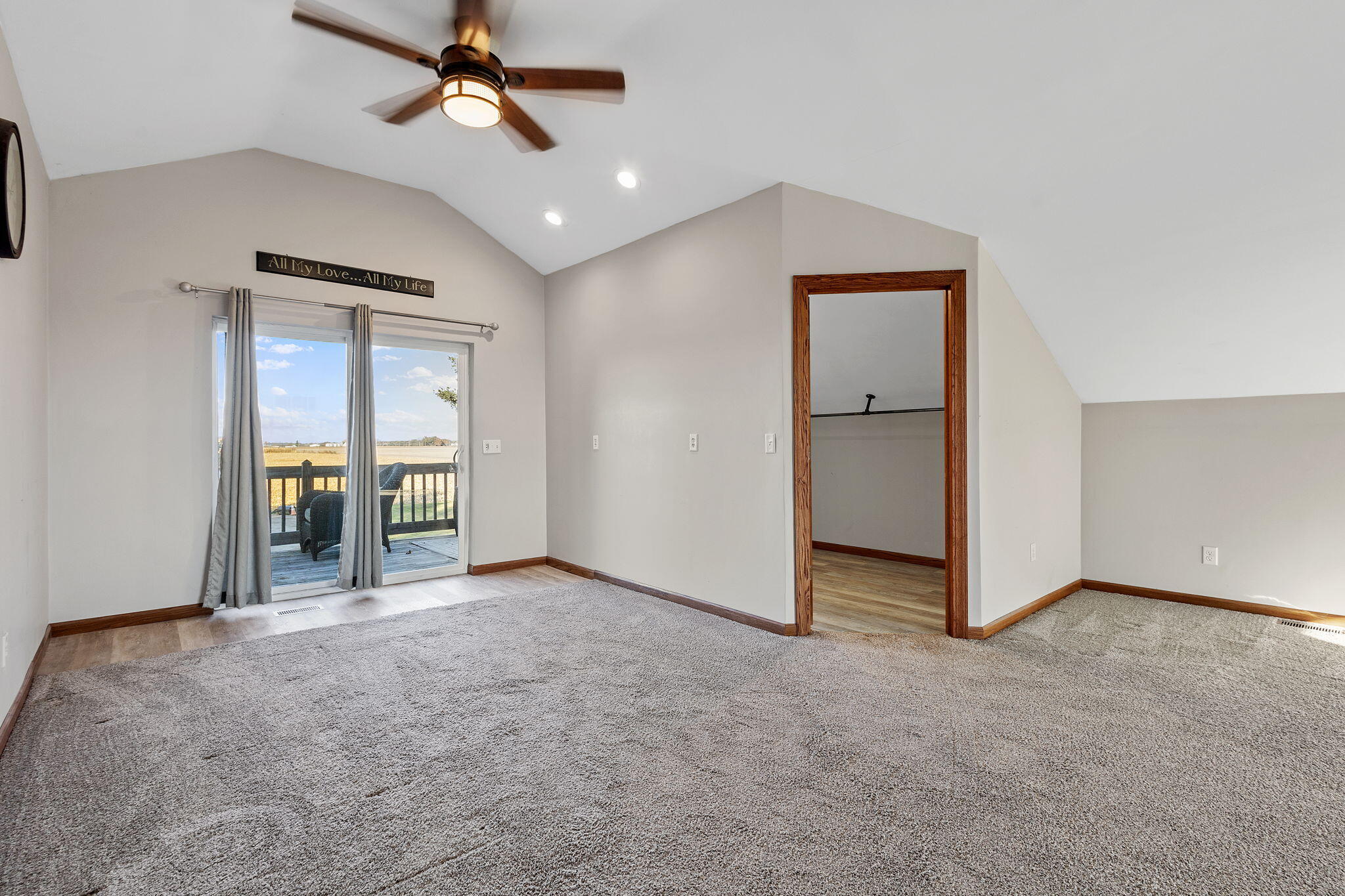 530 South 300 East Kouts, IN 46347 - Photo 25 of 42 an empty room with closet and a ceiling fan