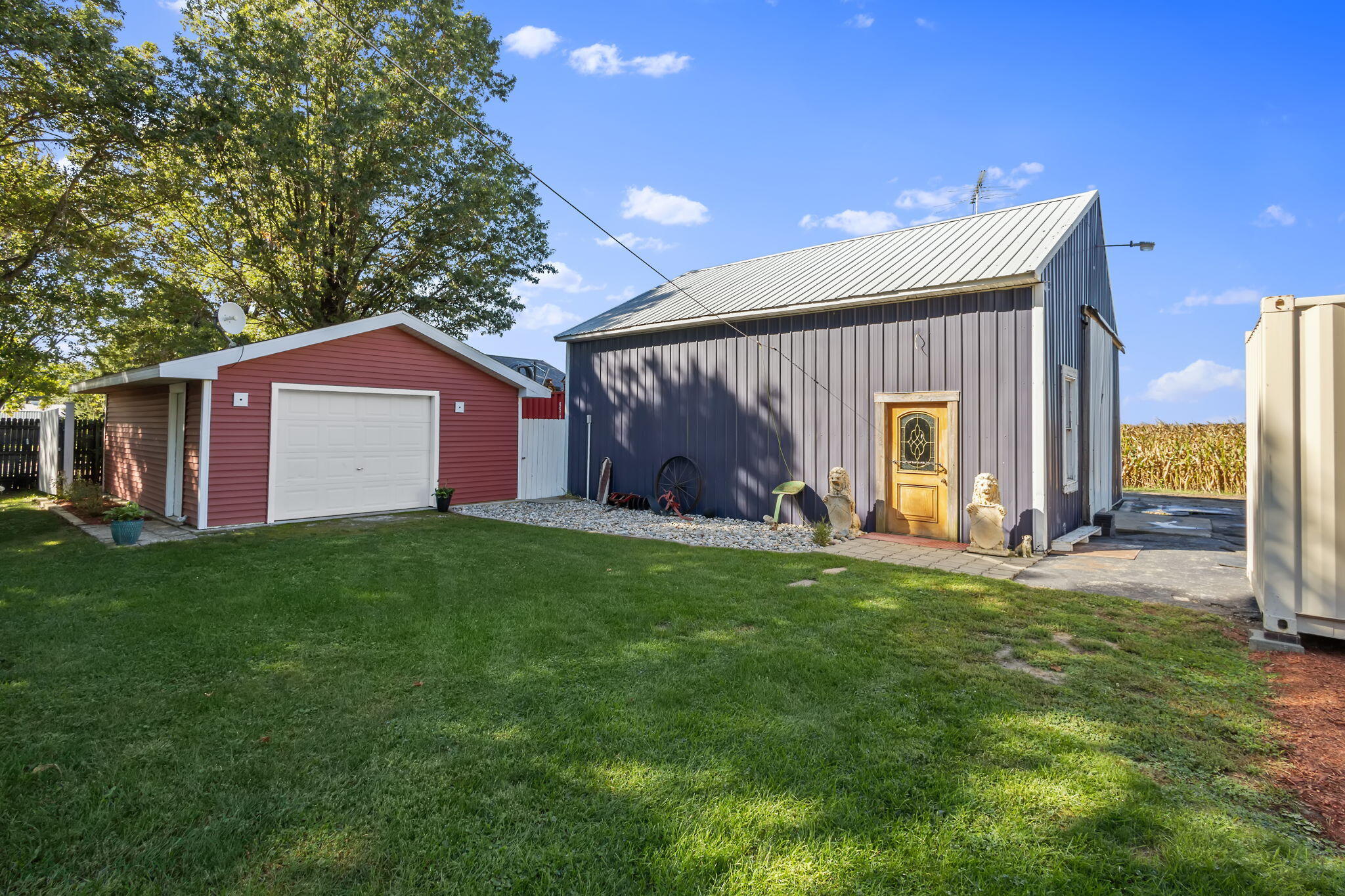530 South 300 East Kouts, IN 46347 - Photo 37 of 42 a view of a house with backyard and a tree