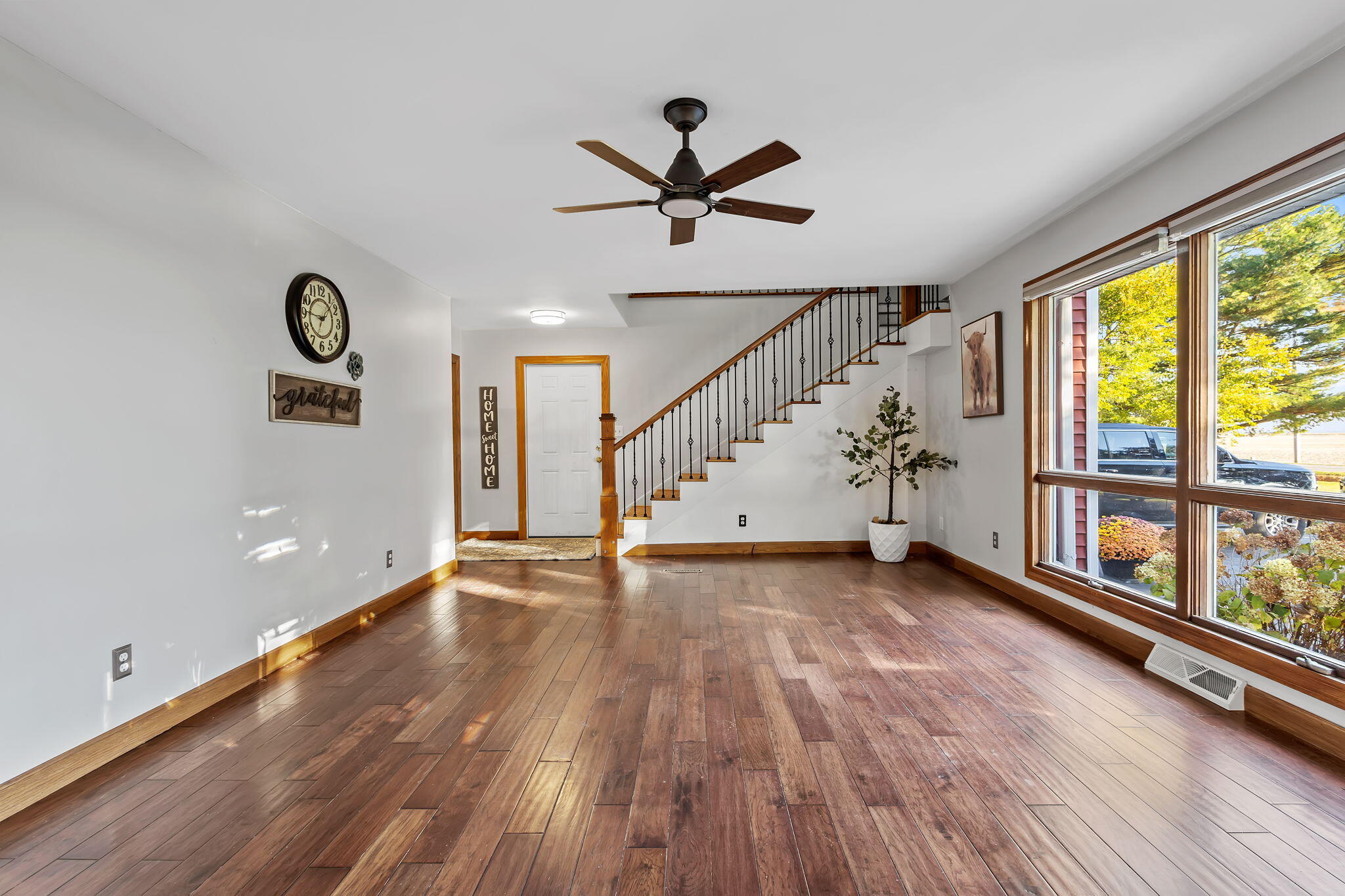 530 South 300 East Kouts, IN 46347 - Photo 8 of 42 wooden floor in an empty room with a window