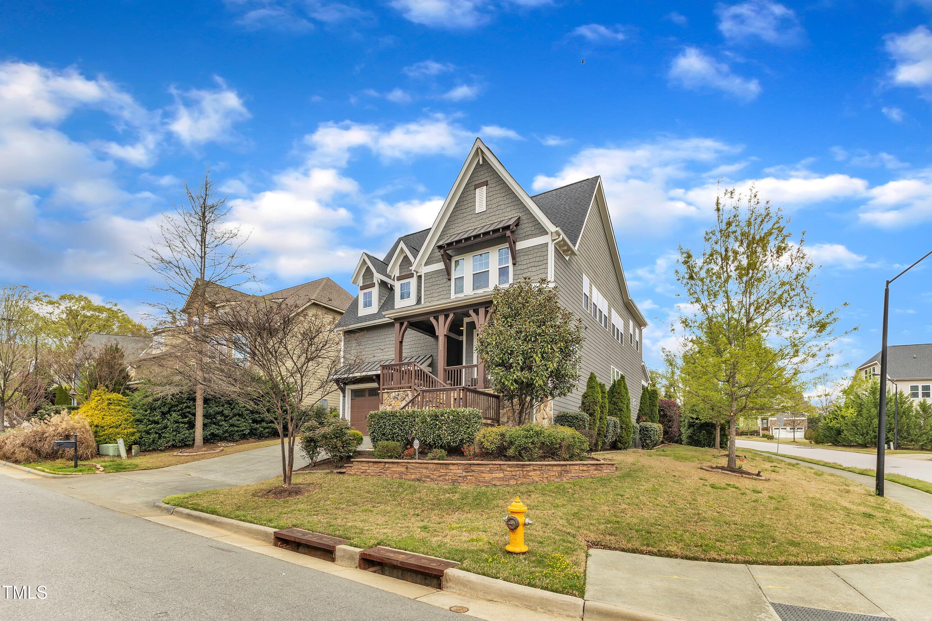 8121 Greys Landing Way Raleigh, NC 27615 - Photo 80 of 95 a front view of a house with a yard
