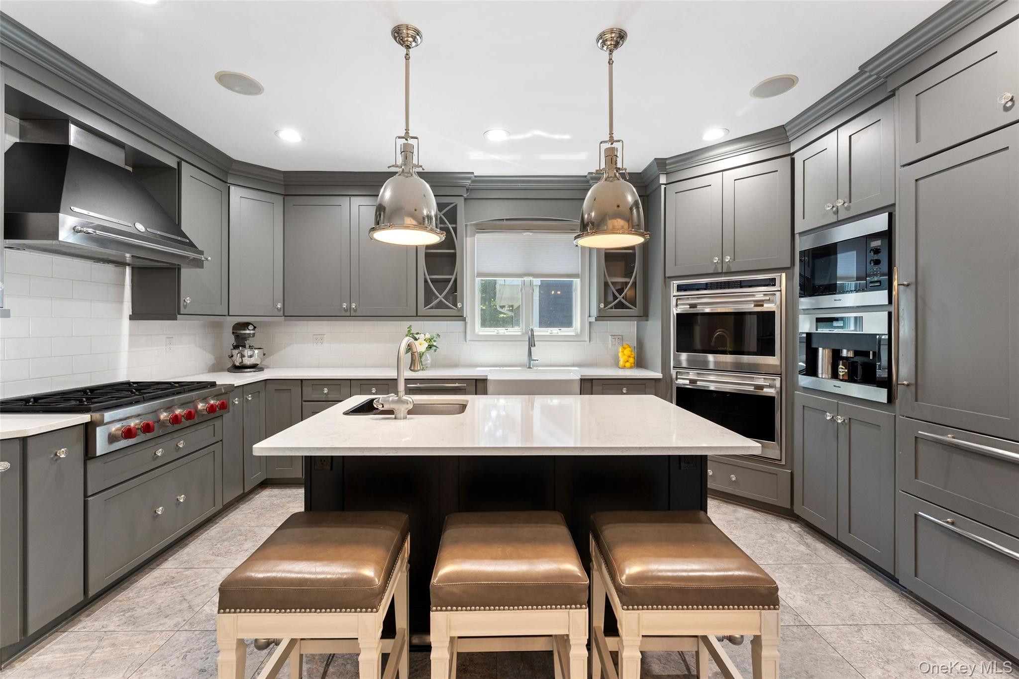 211 Strawtown Road West Nyack, NY 10994 - Photo 9 of 47 Chef's kitchen featuring a Wolf double oven, Wolf 6-burner stove and Miele built in coffee system w grinder.