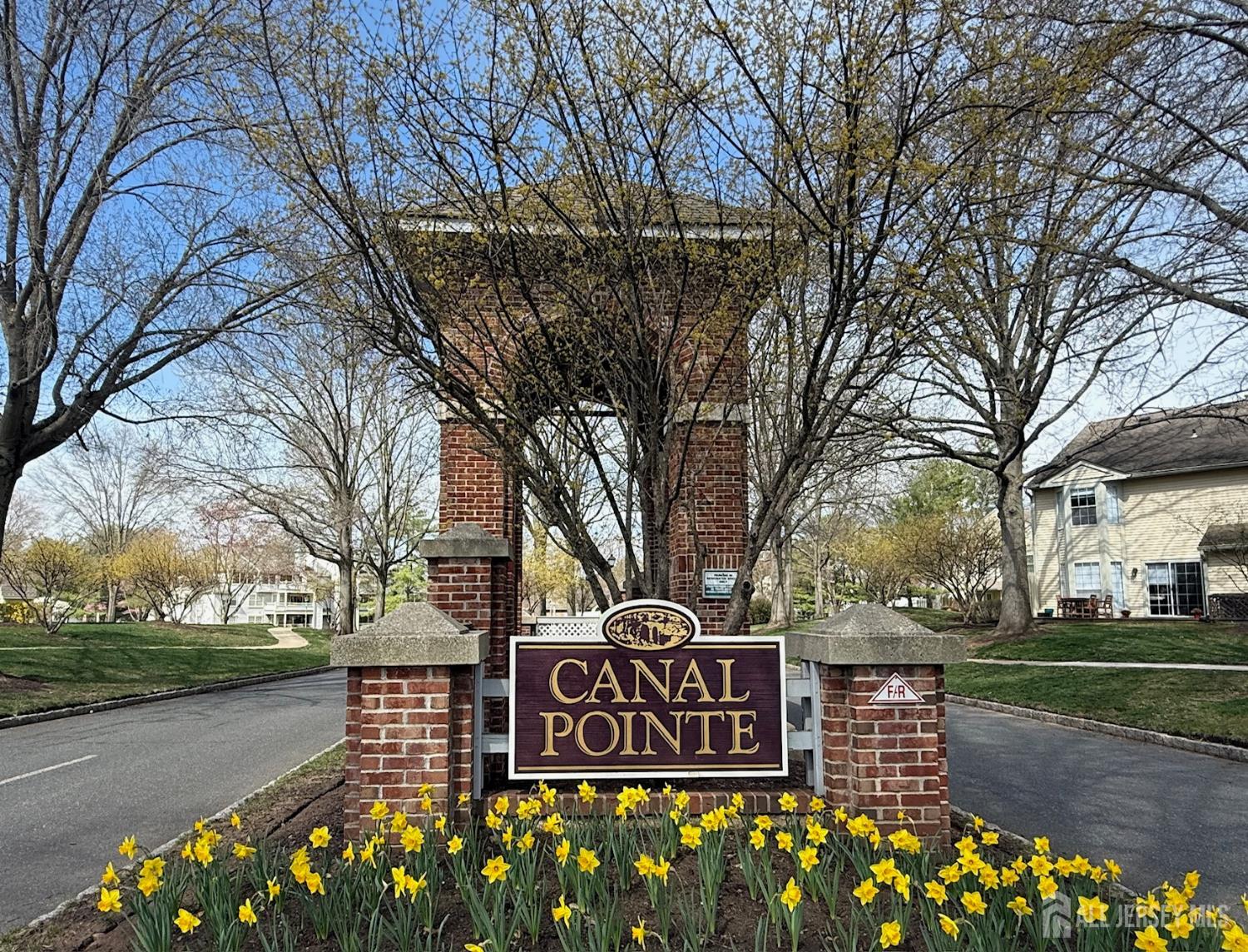 103 Claridge Court, Unit 5 Princeton, NJ 08540 - Photo 2 of 24 a street sign on the side of the road