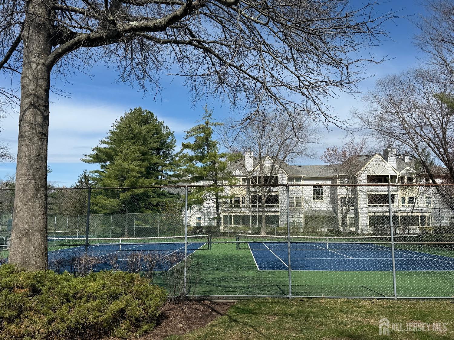 103 Claridge Court, Unit 5 Princeton, NJ 08540 - Photo 22 of 24 a view of a house with a yard