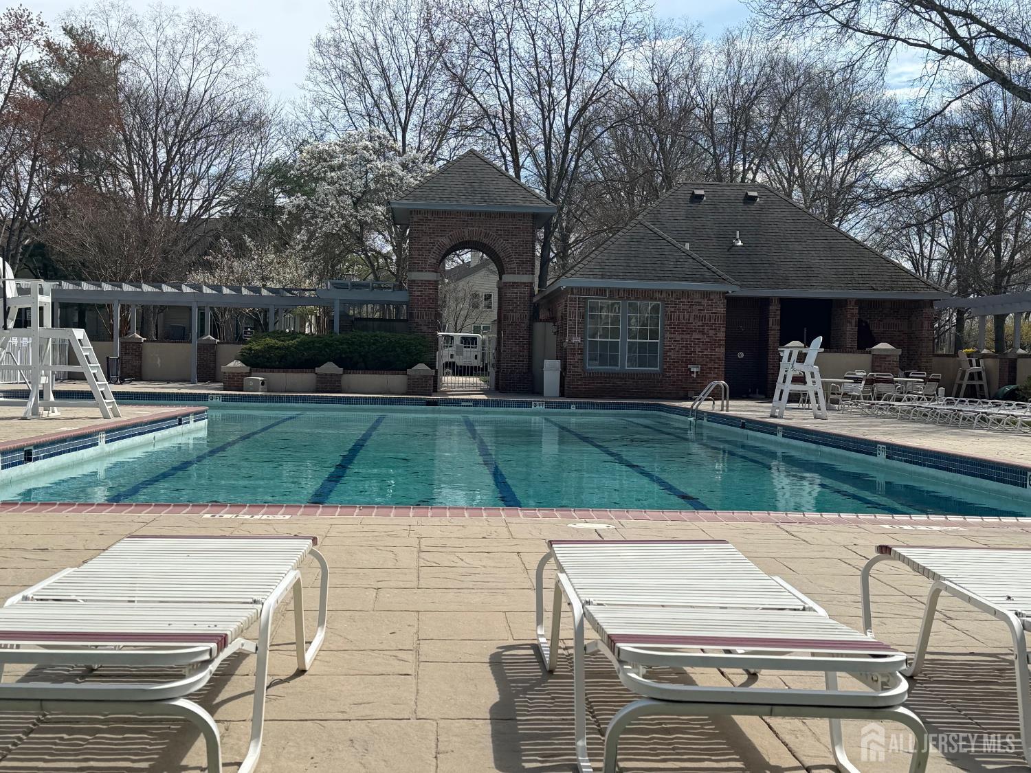 103 Claridge Court, Unit 5 Princeton, NJ 08540 - Photo 23 of 24 a view of a house with a yard