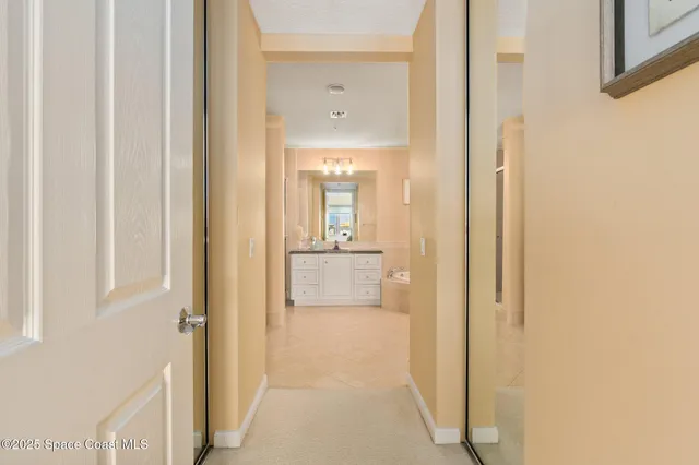 a bathroom with a granite countertop sink mirror and a