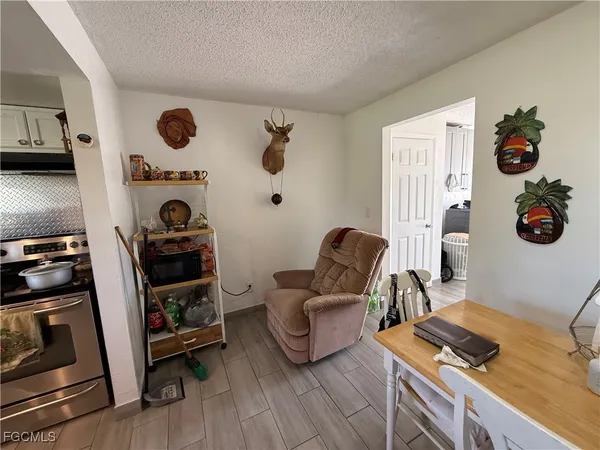 a living room with furniture and a gate