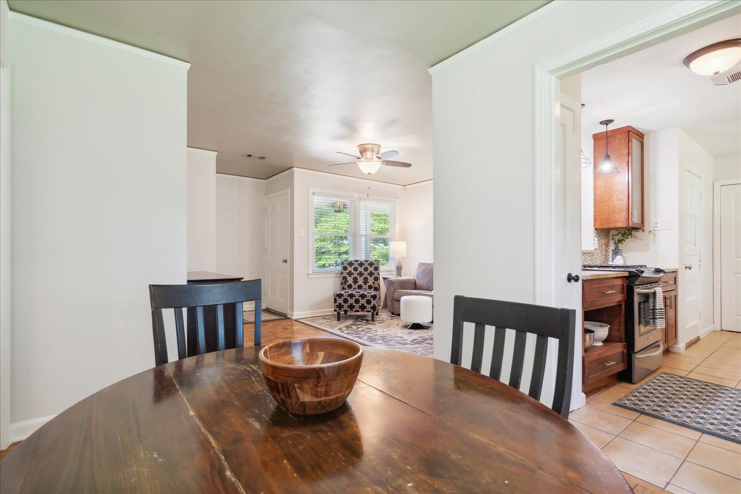 5013 New Castle Road Memphis, TN 38117 - Photo 13 of 28 a living room with furniture a rug and a potted plant