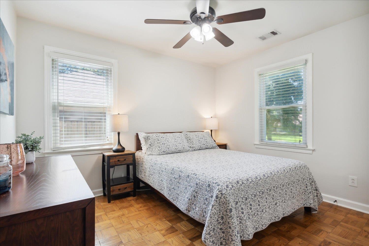 5013 New Castle Road Memphis, TN 38117 - Photo 21 of 28 a bedroom with a large bed and a desk