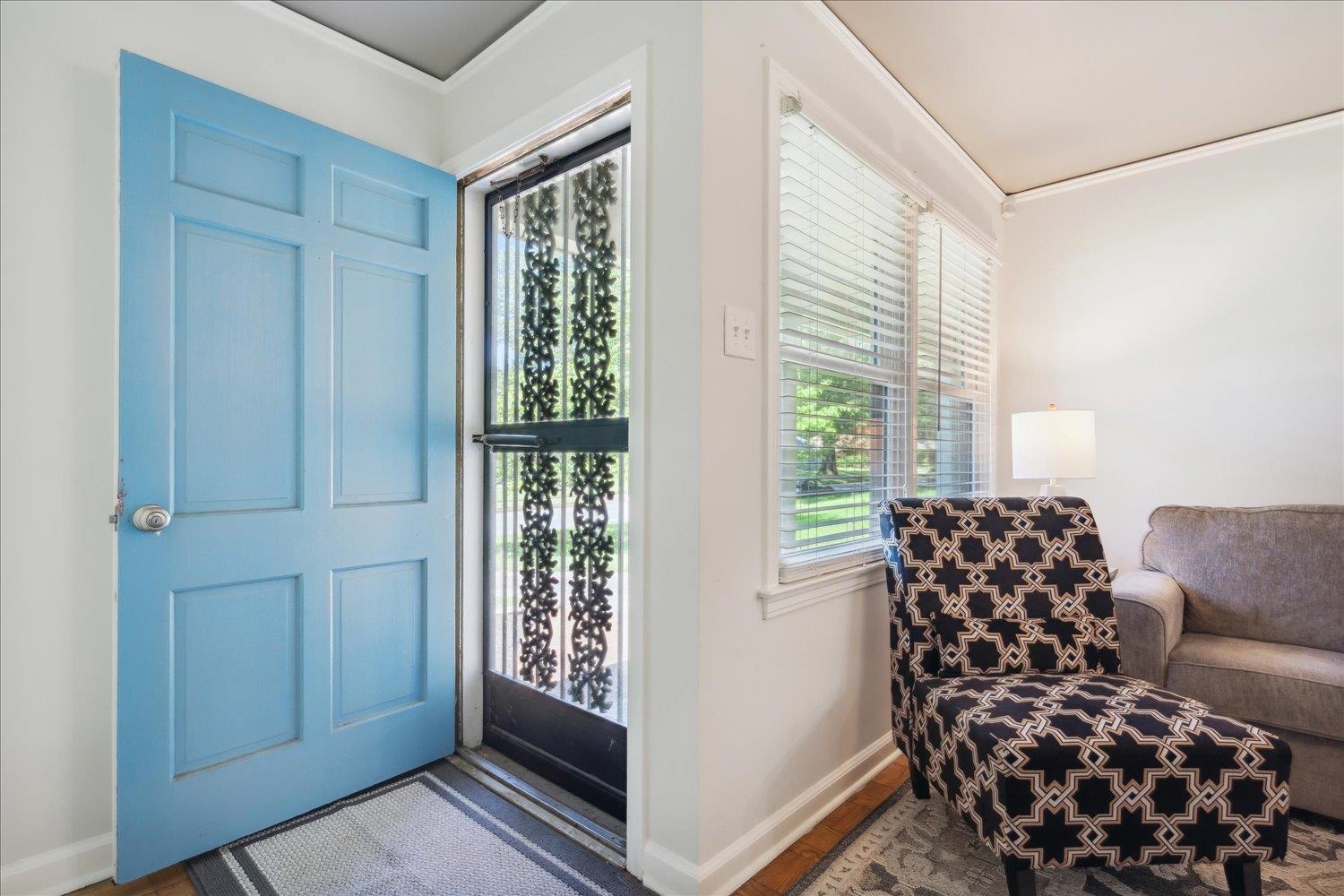 5013 New Castle Road Memphis, TN 38117 - Photo 6 of 28 a bedroom with a bed and a window