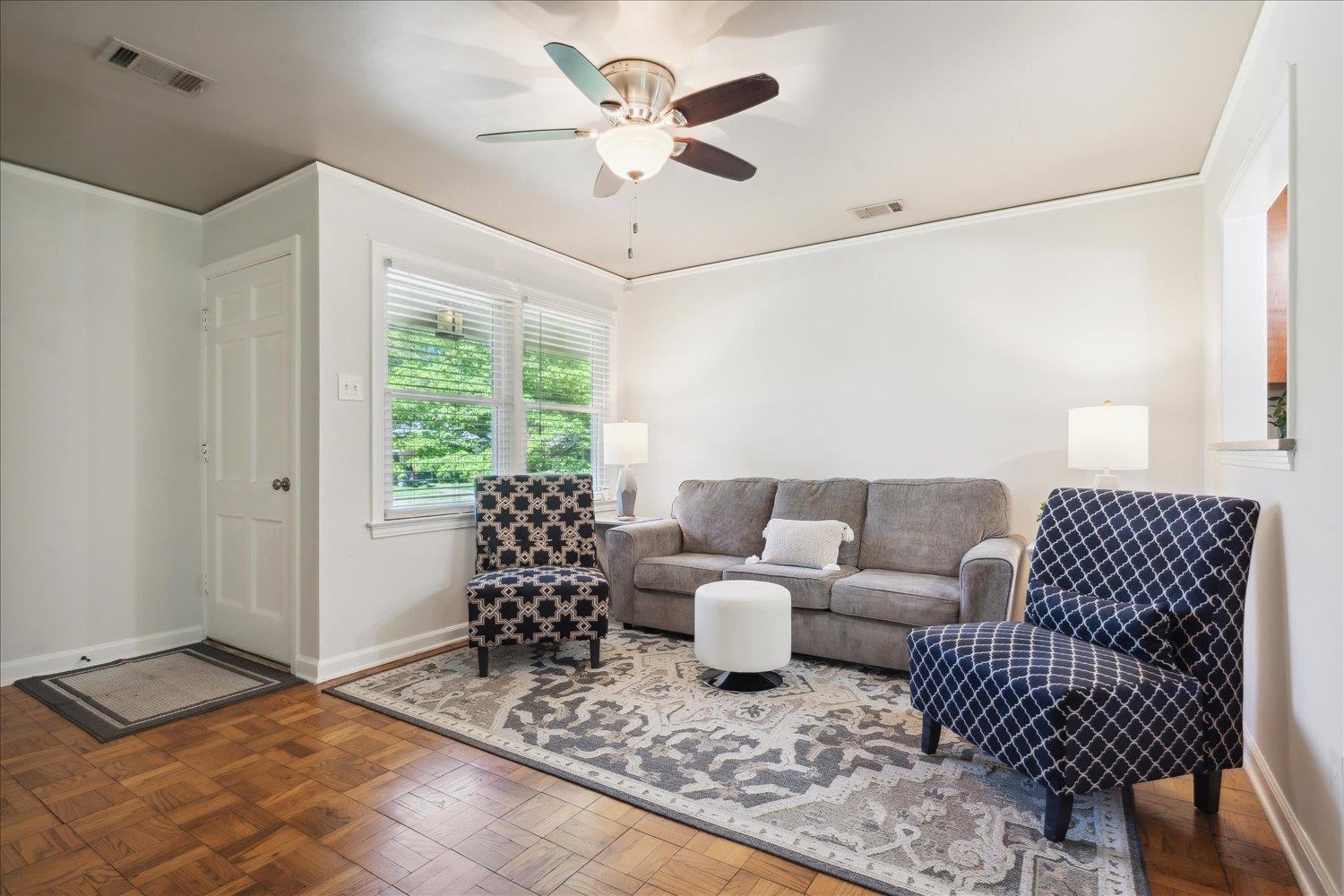 5013 New Castle Road Memphis, TN 38117 - Photo 7 of 28 a living room with furniture and a large window