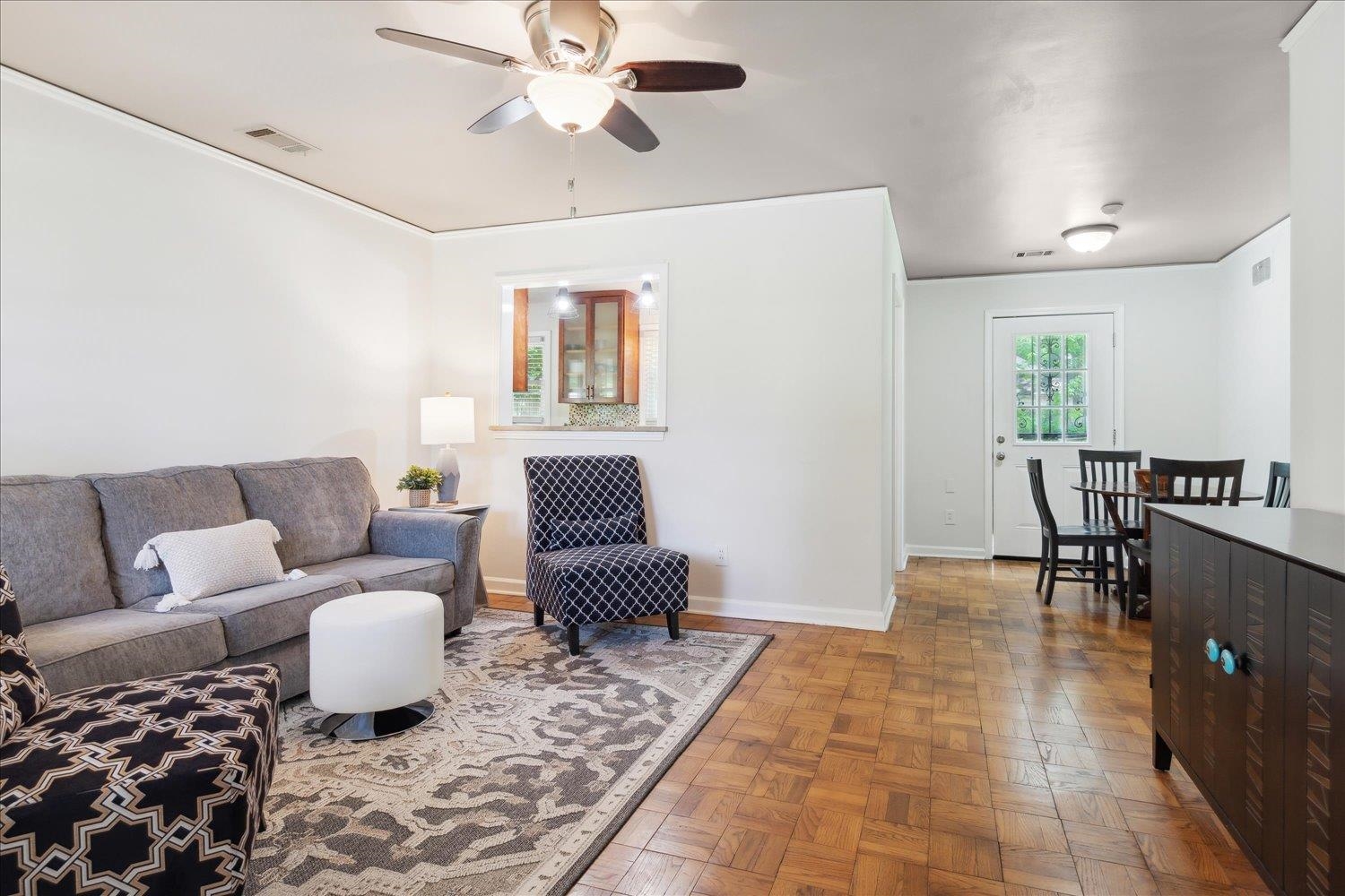 5013 New Castle Road Memphis, TN 38117 - Photo 8 of 28 a living room with furniture and a rug