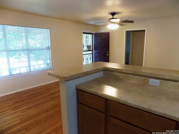 a kitchen with a sink and a window