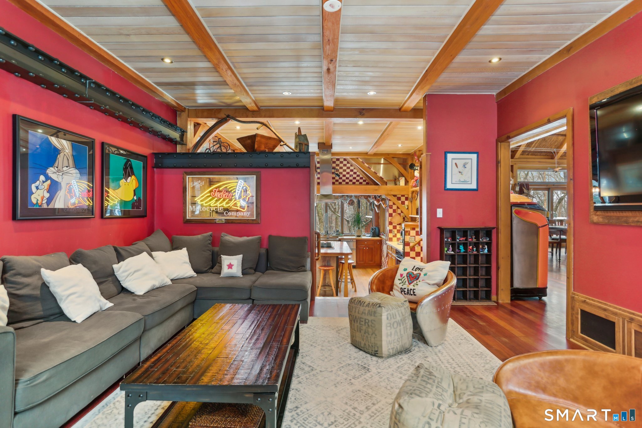 142 Seventy Acre Road Redding, CT 06896 - Photo 10 of 40 a living room with furniture and a chandelier