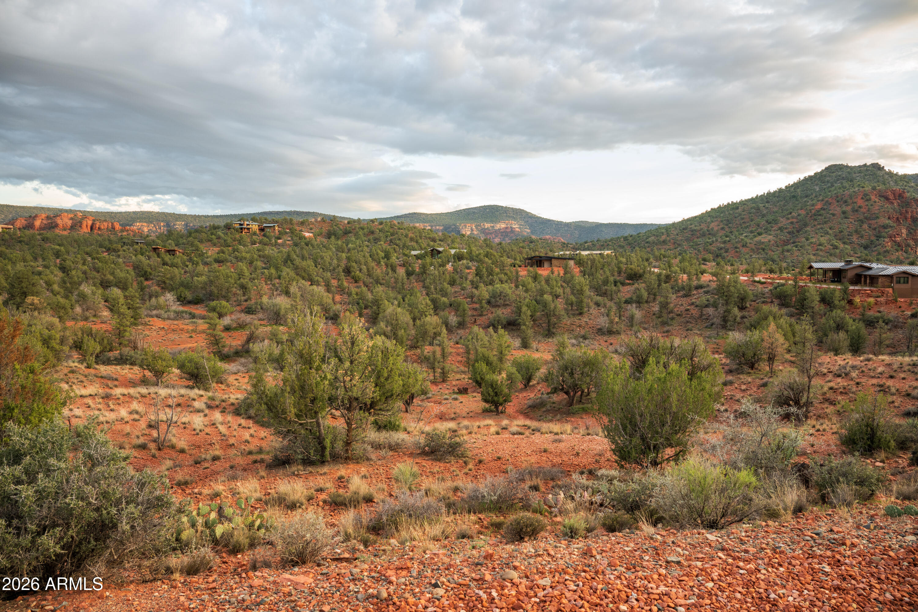 35 Russet Ridge Place, Unit 78 Sedona, AZ 86336 - Photo 11 of 30 a view of a lake with mountains in the background
