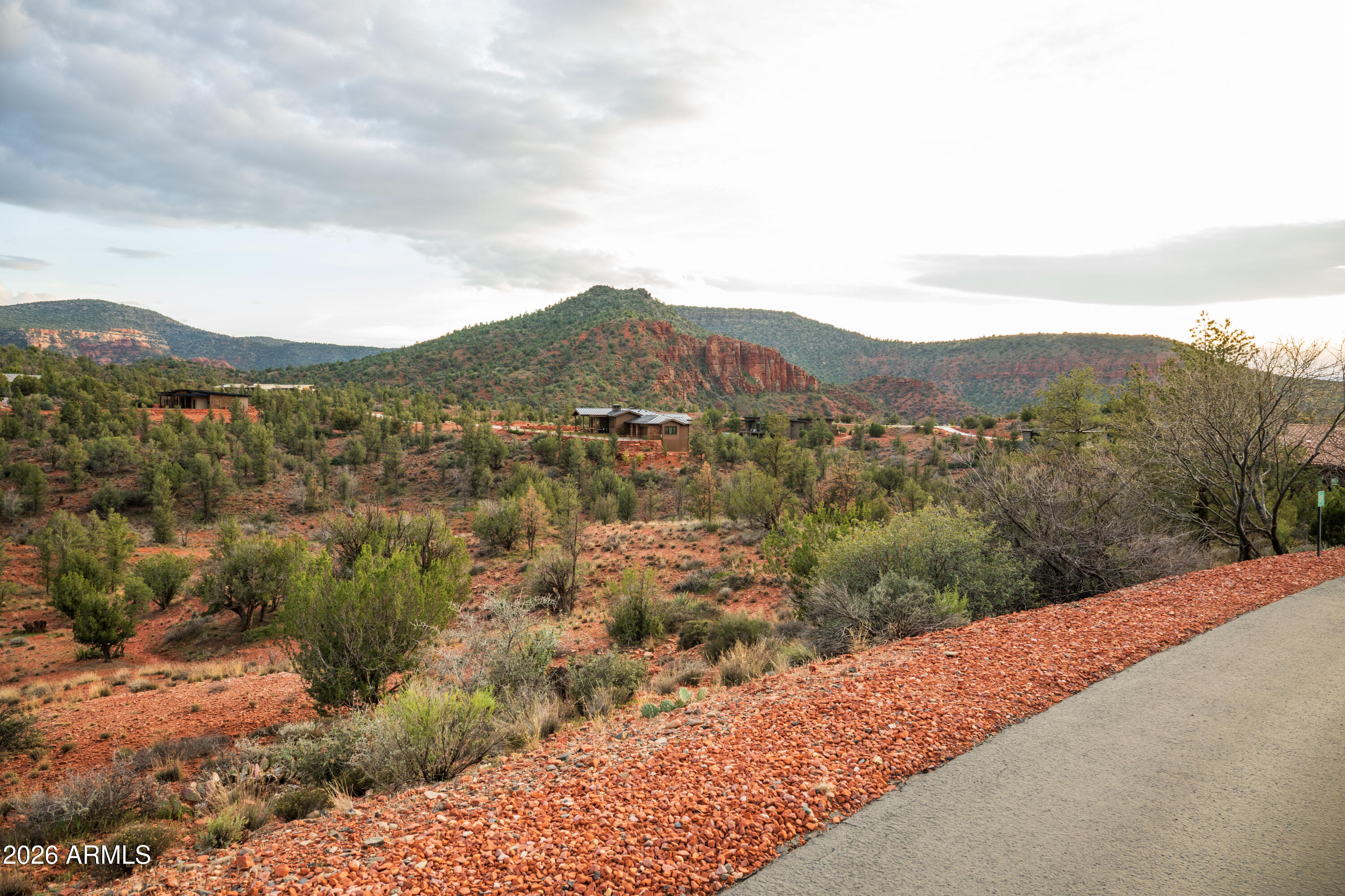 35 Russet Ridge Place, Unit 78 Sedona, AZ 86336 - Photo 26 of 30 a view of a forest with mountains in the background