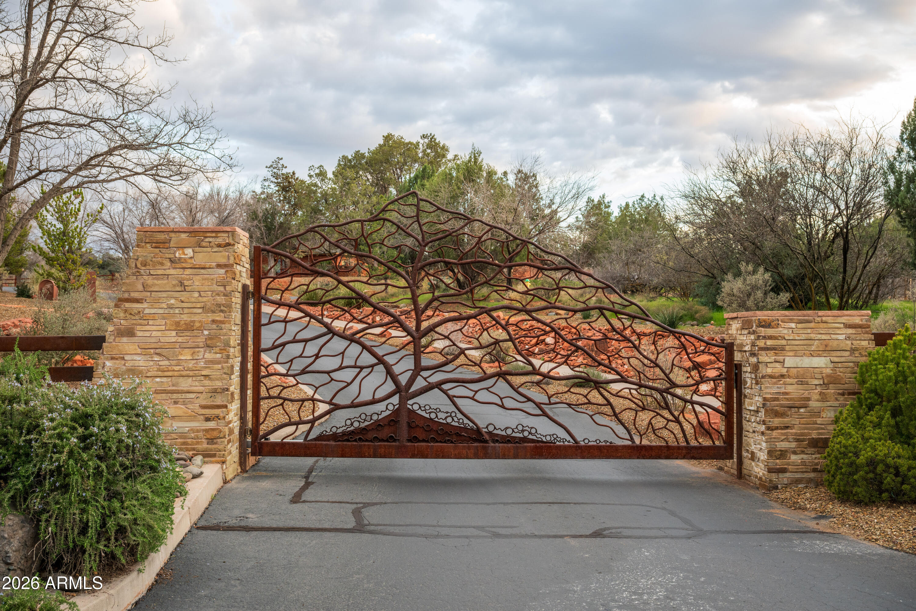 35 Russet Ridge Place, Unit 78 Sedona, AZ 86336 - Photo 30 of 30 a backyard of a house with lots of green space