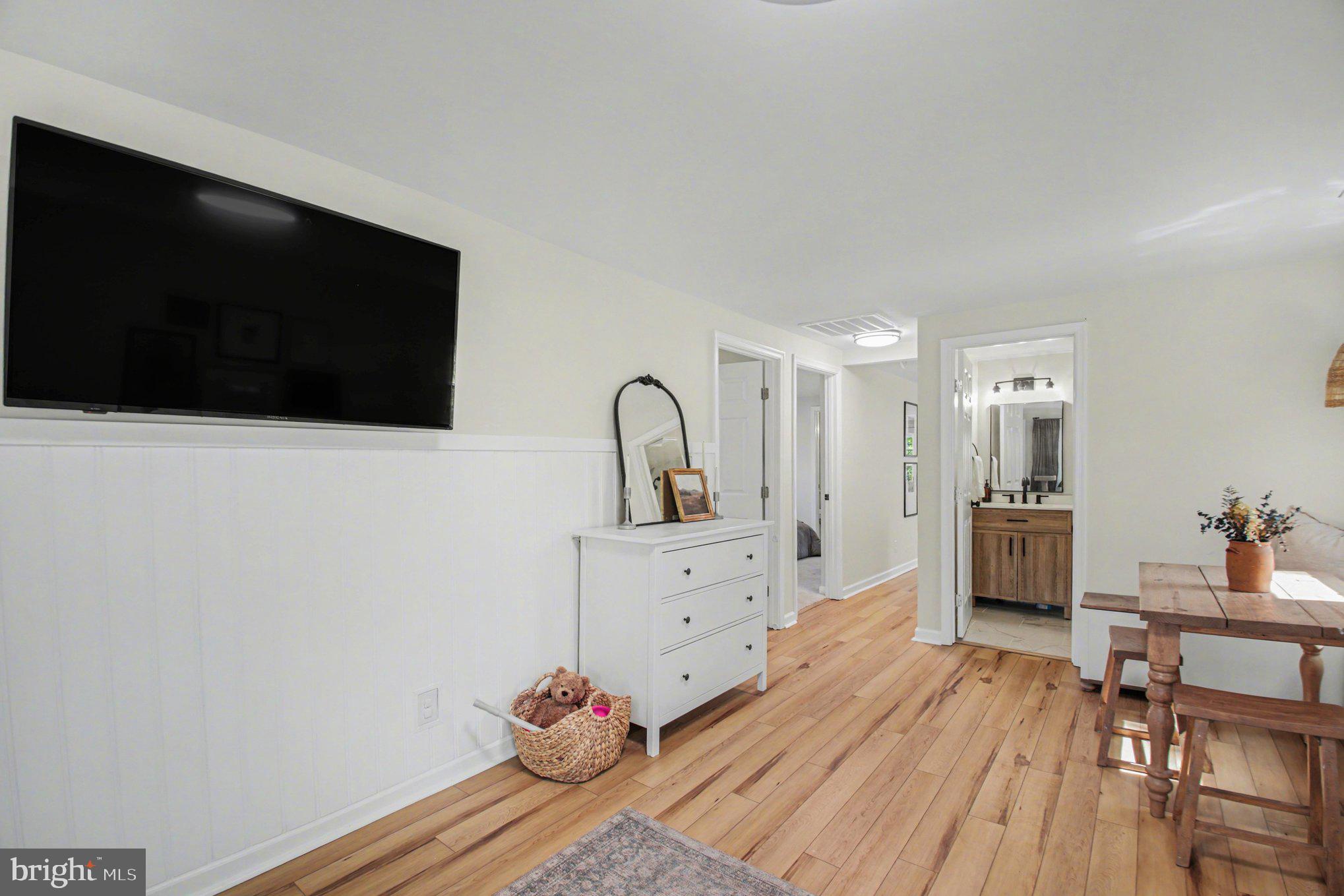 2137 Chapel Way King George, VA 22485 - Photo 11 of 65 a living room with furniture and a flat screen tv