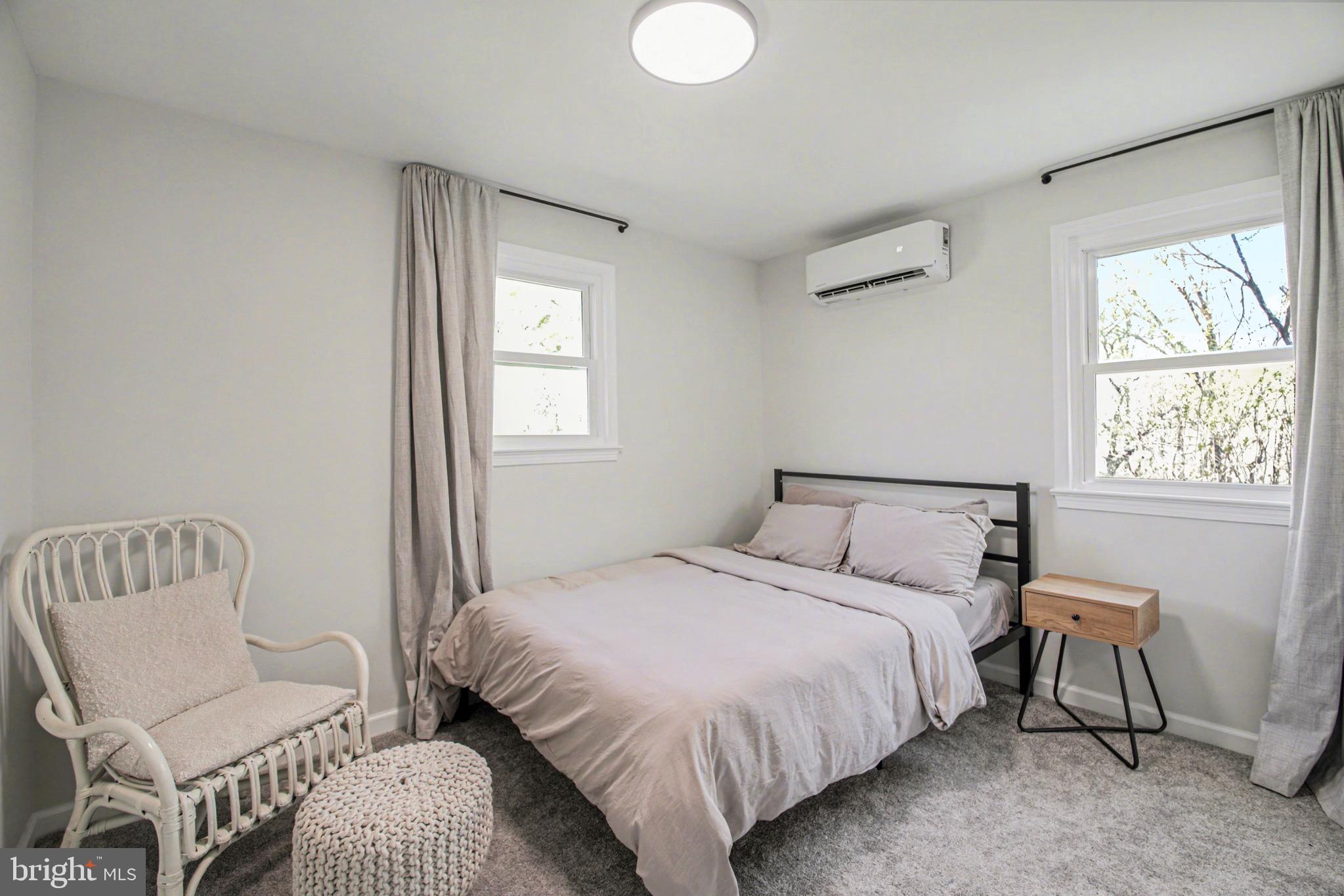 2137 Chapel Way King George, VA 22485 - Photo 25 of 65 a bedroom with a bed and a chair