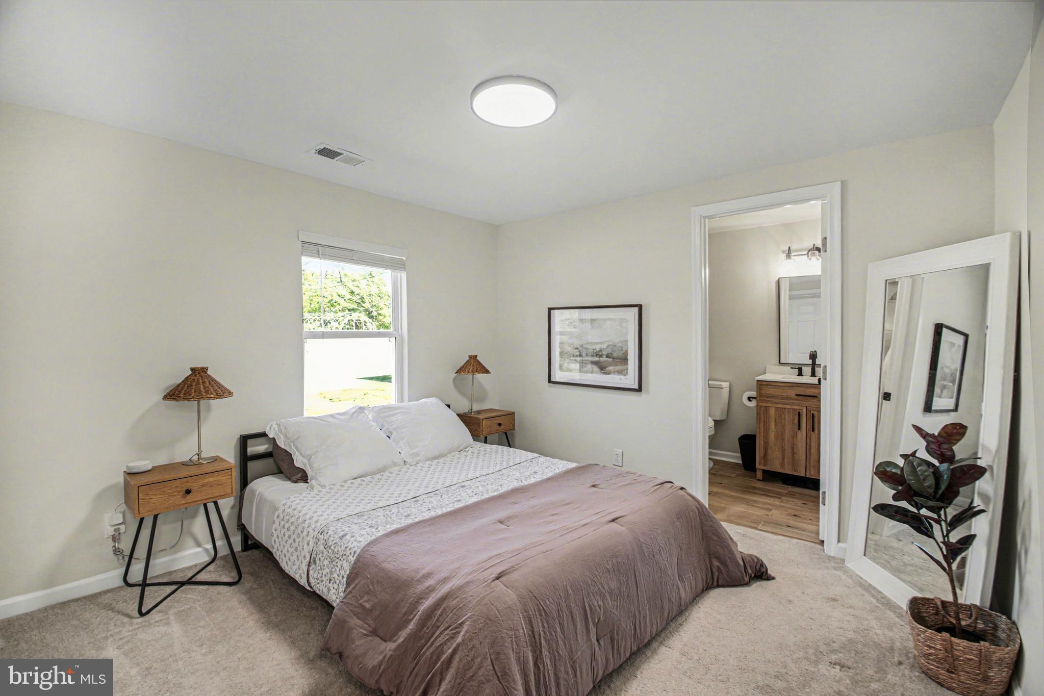 2137 Chapel Way King George, VA 22485 - Photo 29 of 65 a bedroom with a bed and a flat tv screen on the dresser