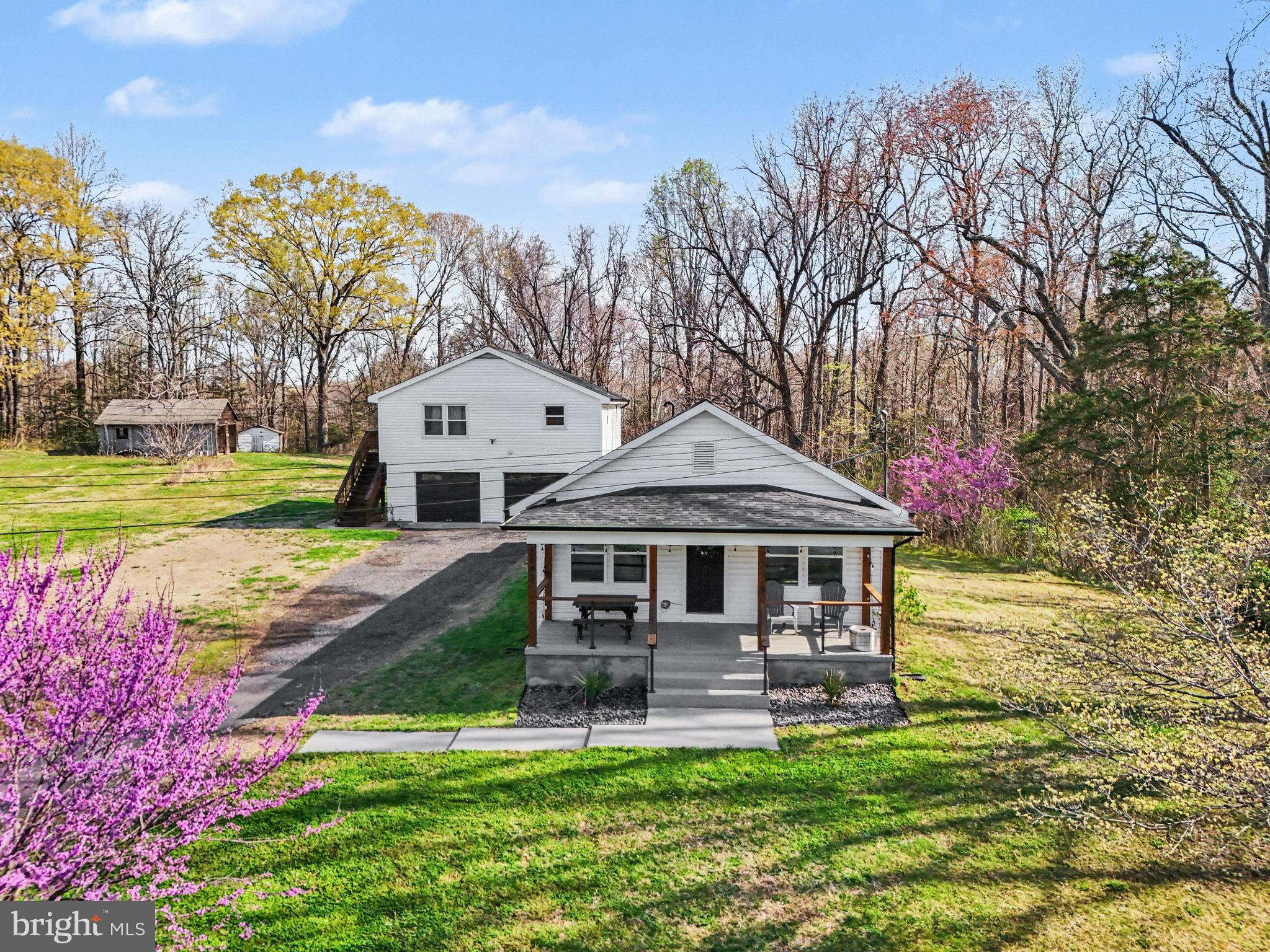 2137 Chapel Way King George, VA 22485 - Photo 3 of 65 a front view of a house with a yard