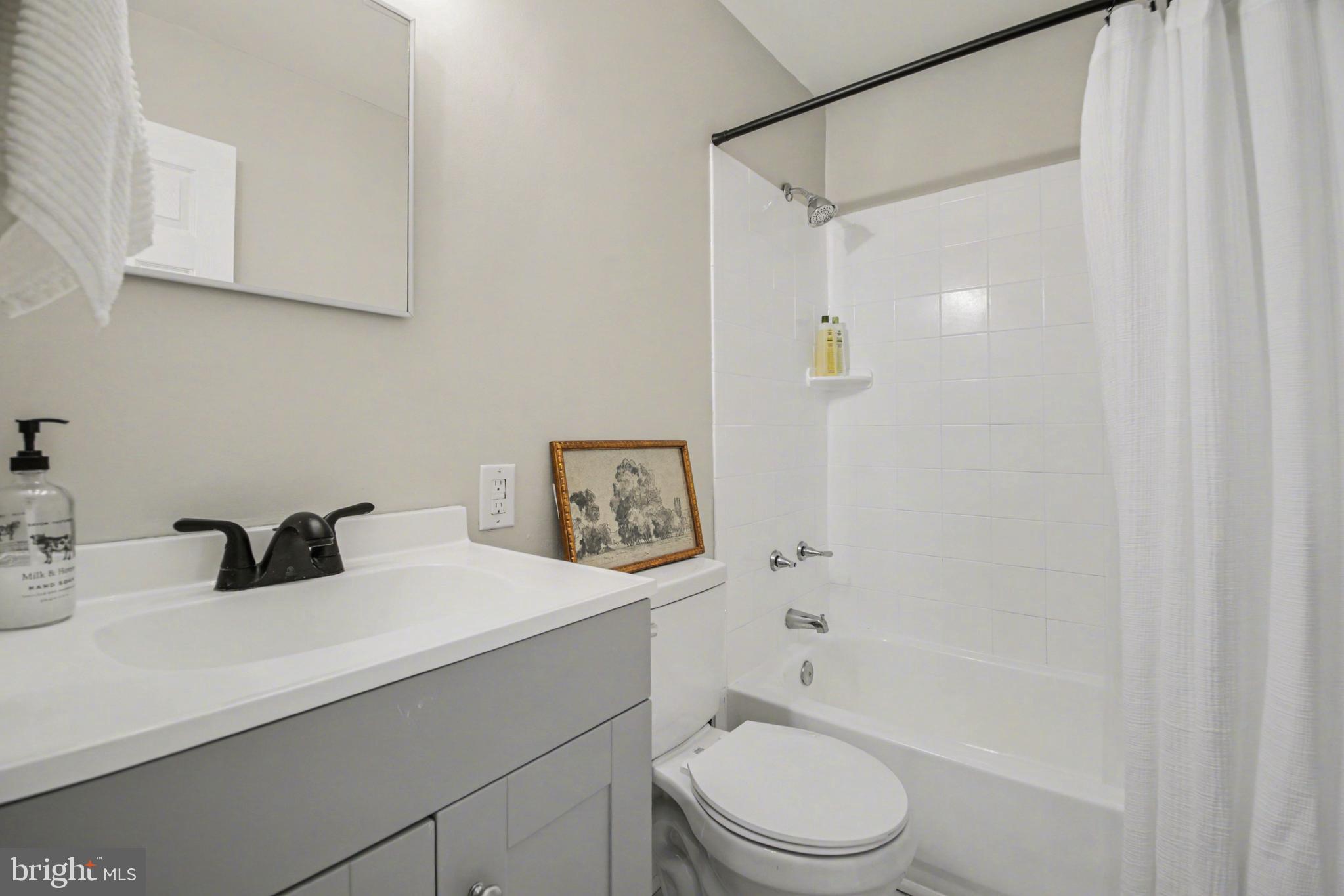 2137 Chapel Way King George, VA 22485 - Photo 49 of 65 a bathroom with a sink a toilet and shower