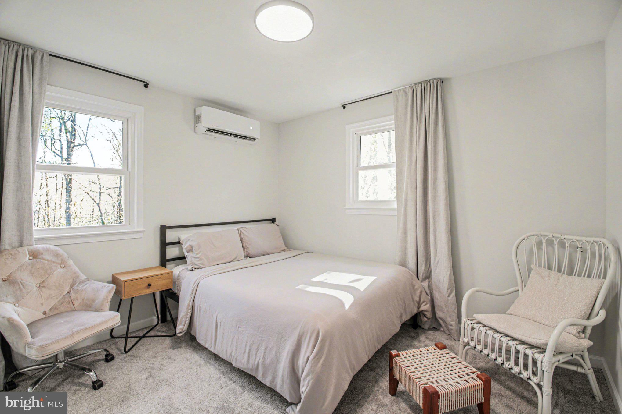 2137 Chapel Way King George, VA 22485 - Photo 51 of 65 a bedroom with a bed and a couch