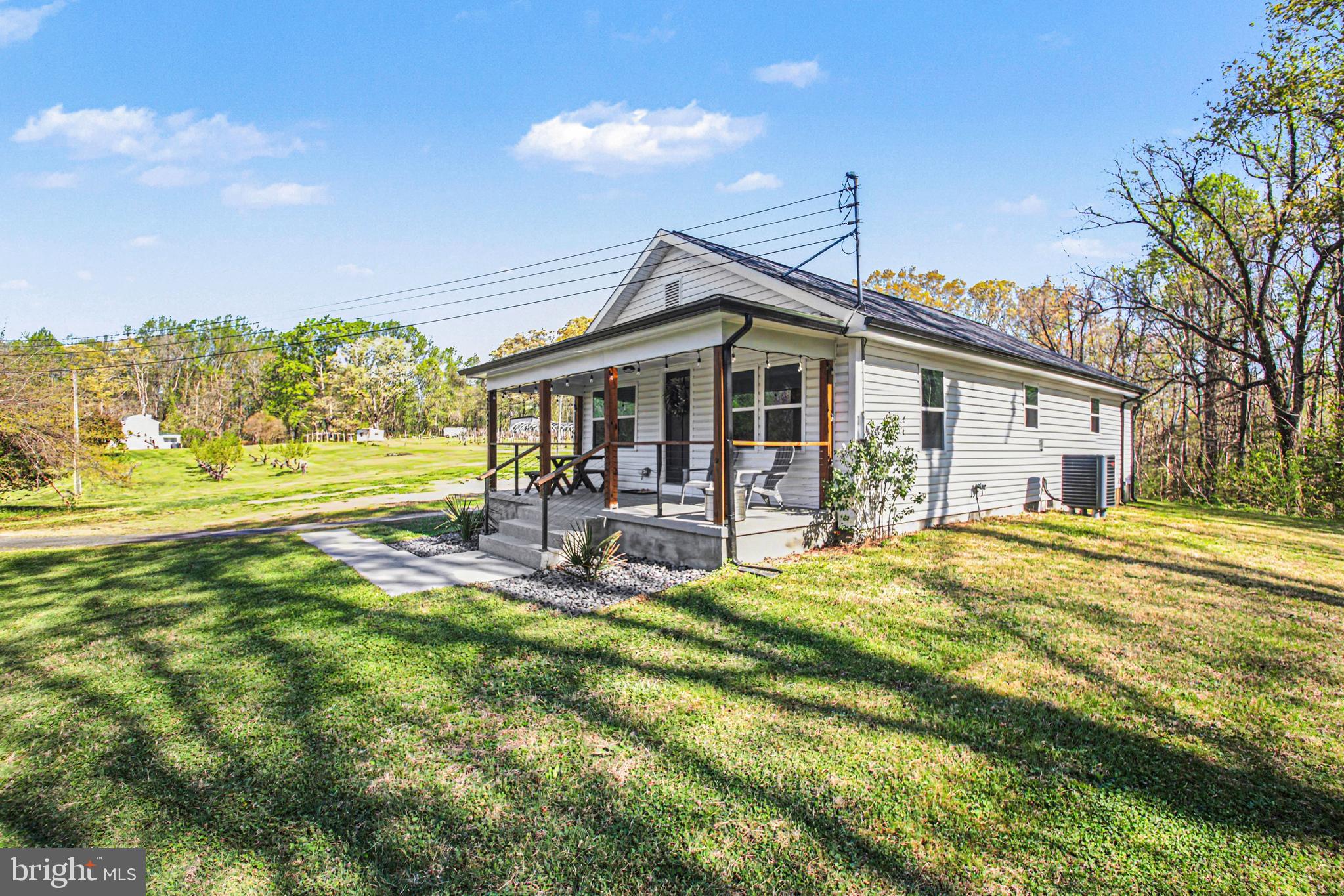 2137 Chapel Way King George, VA 22485 - Photo 52 of 65 a view of a house with a yard patio and swimming pool
