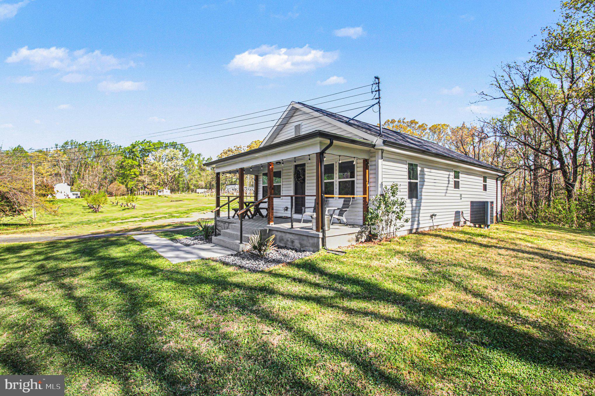 2137 Chapel Way King George, VA 22485 - Photo 60 of 65 a view of a house with a yard patio and swimming pool