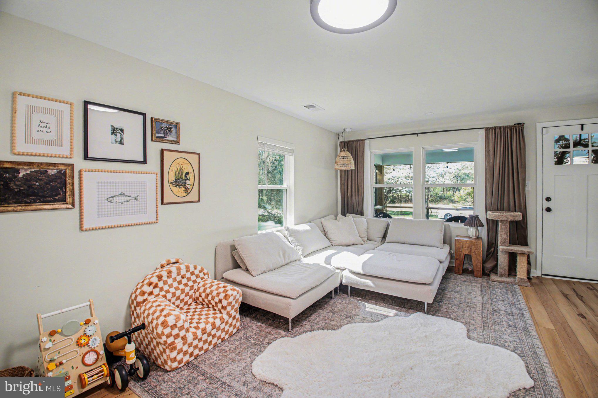 2137 Chapel Way King George, VA 22485 - Photo 8 of 65 a living room with furniture rug and window