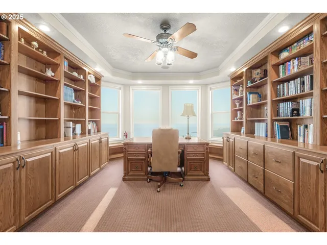 a workspace with furniture and windows