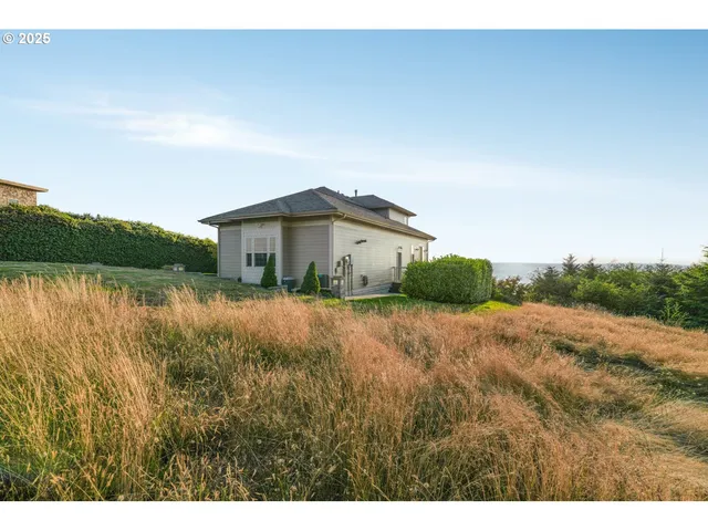 a house with river in front of it