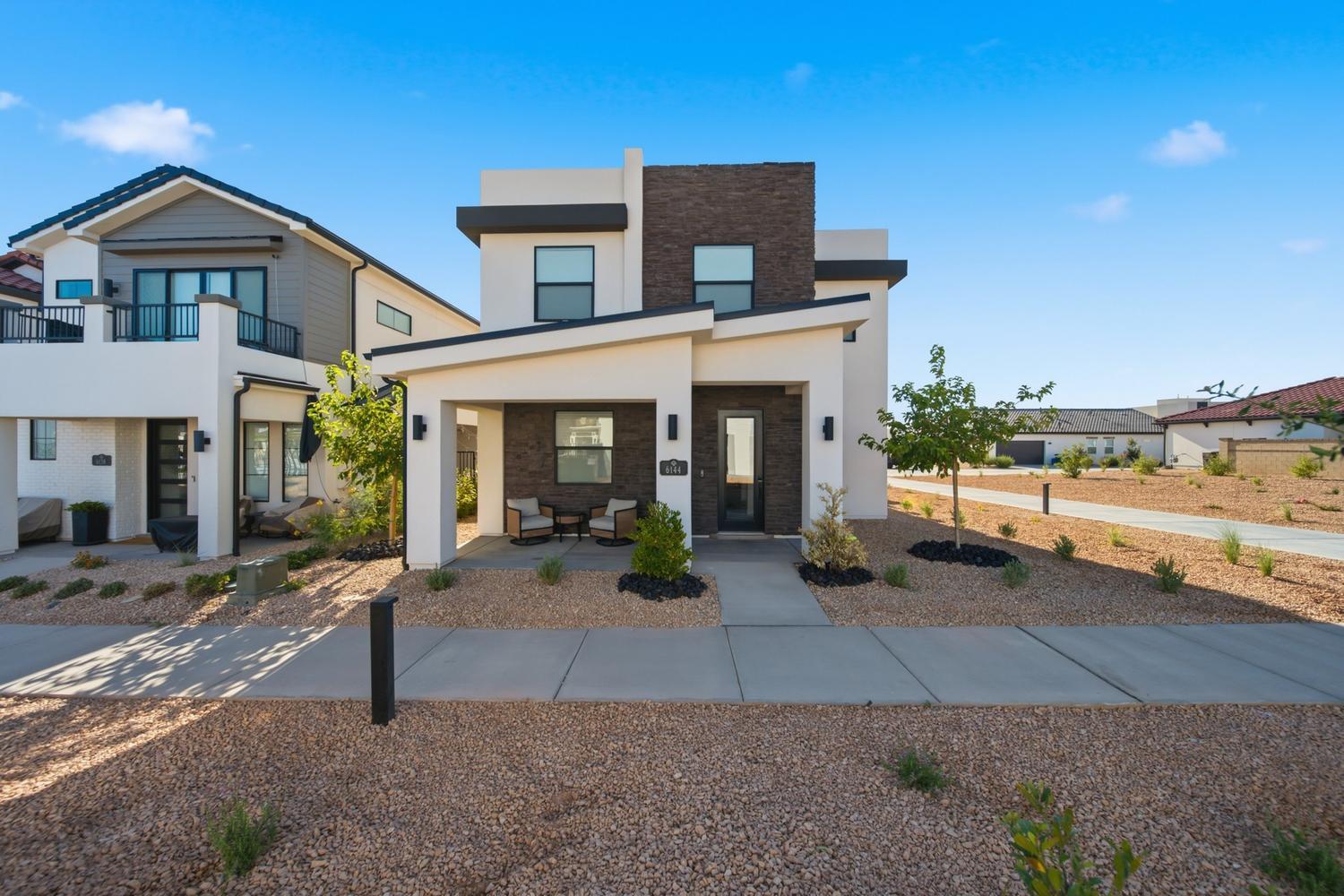 6144 Red Sand Lane St. George, UT 84790 - Photo 1 of 19 Beautifully finished 4-bedroom + office, 3-bath home with 2,417 sq. ft. of open-concept living. Features include luxury Restoration Hardware, quartz/granite countertops, soft-close cabinetry, stainless steel appliances, abundant natural light, and an oversized 3-car garage with epoxy floors and built-in storage. Enjoy upgraded landscaping, a covered patio, and Desert Color’s lagoon, pool, spa, trails, parks, and pickleball courts.