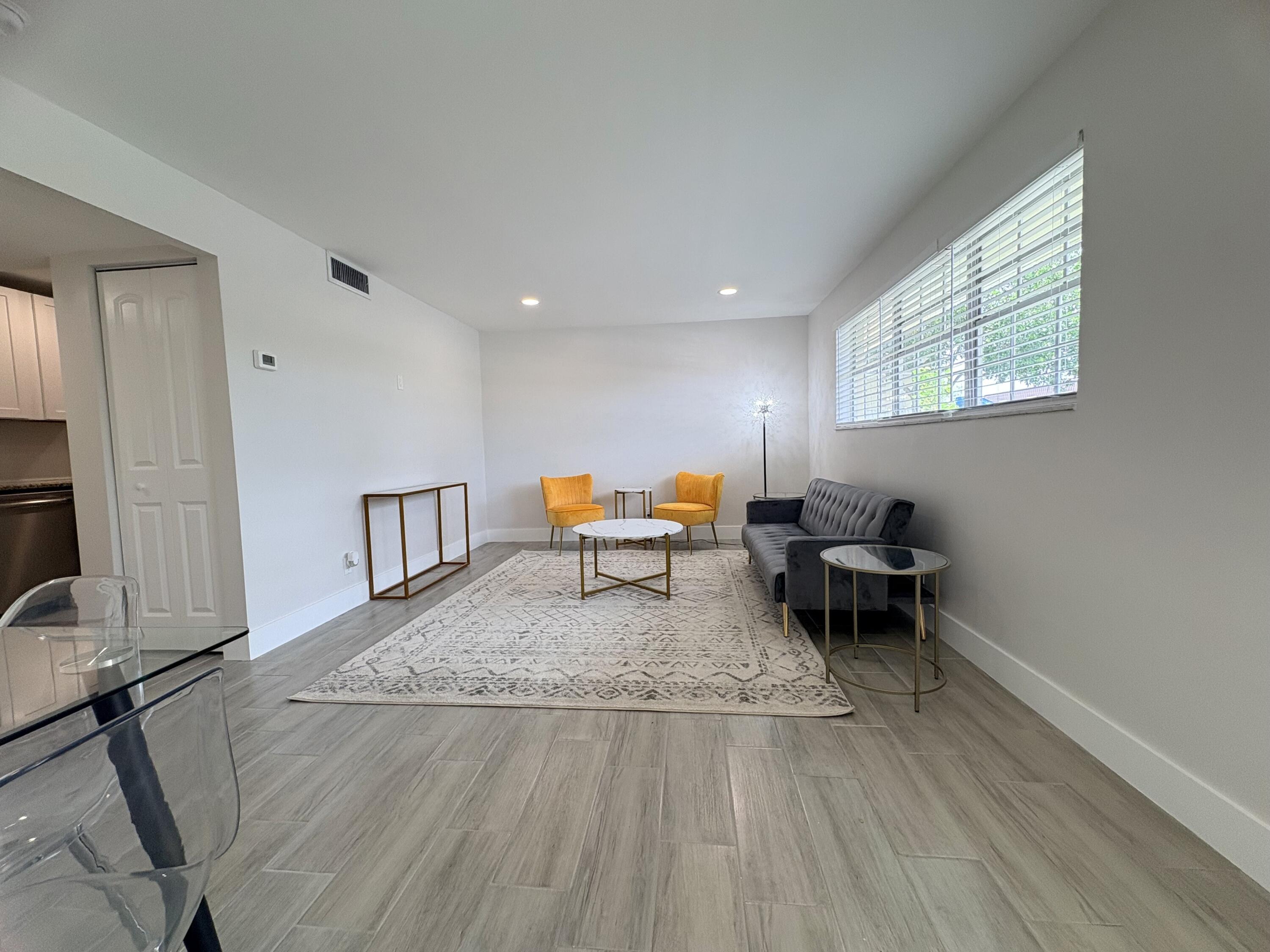 2202 Northeast 36th Street, Unit 17 Lighthouse Point, FL 33064 - Photo 8 of 28 Living Room