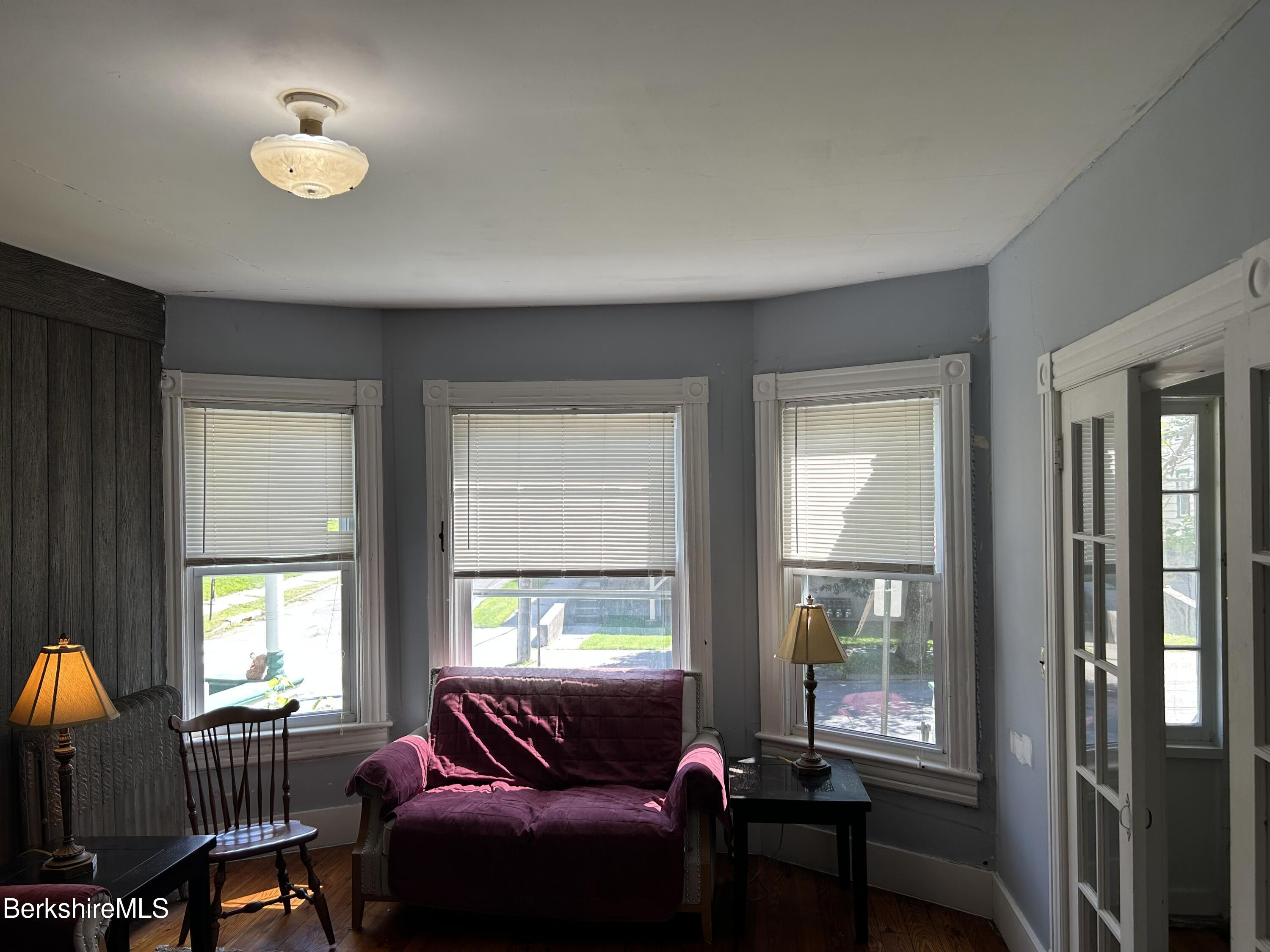 46 Summer Street Adams, MA 01220 - Photo 15 of 35 a living room with furniture and a window