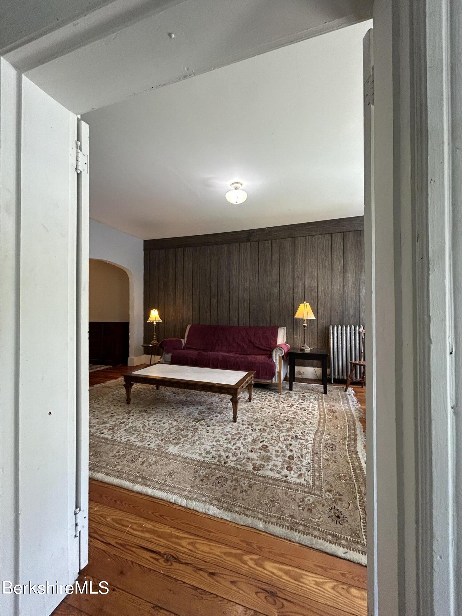 46 Summer Street Adams, MA 01220 - Photo 16 of 35 a living room with furniture and a rug