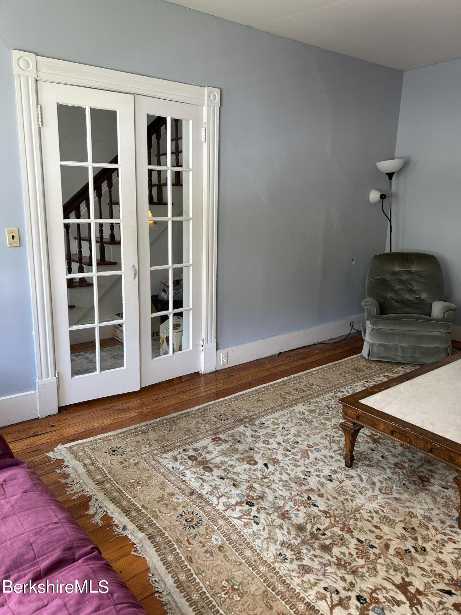 46 Summer Street Adams, MA 01220 - Photo 17 of 35 a view of a livingroom with wooden floor and a window
