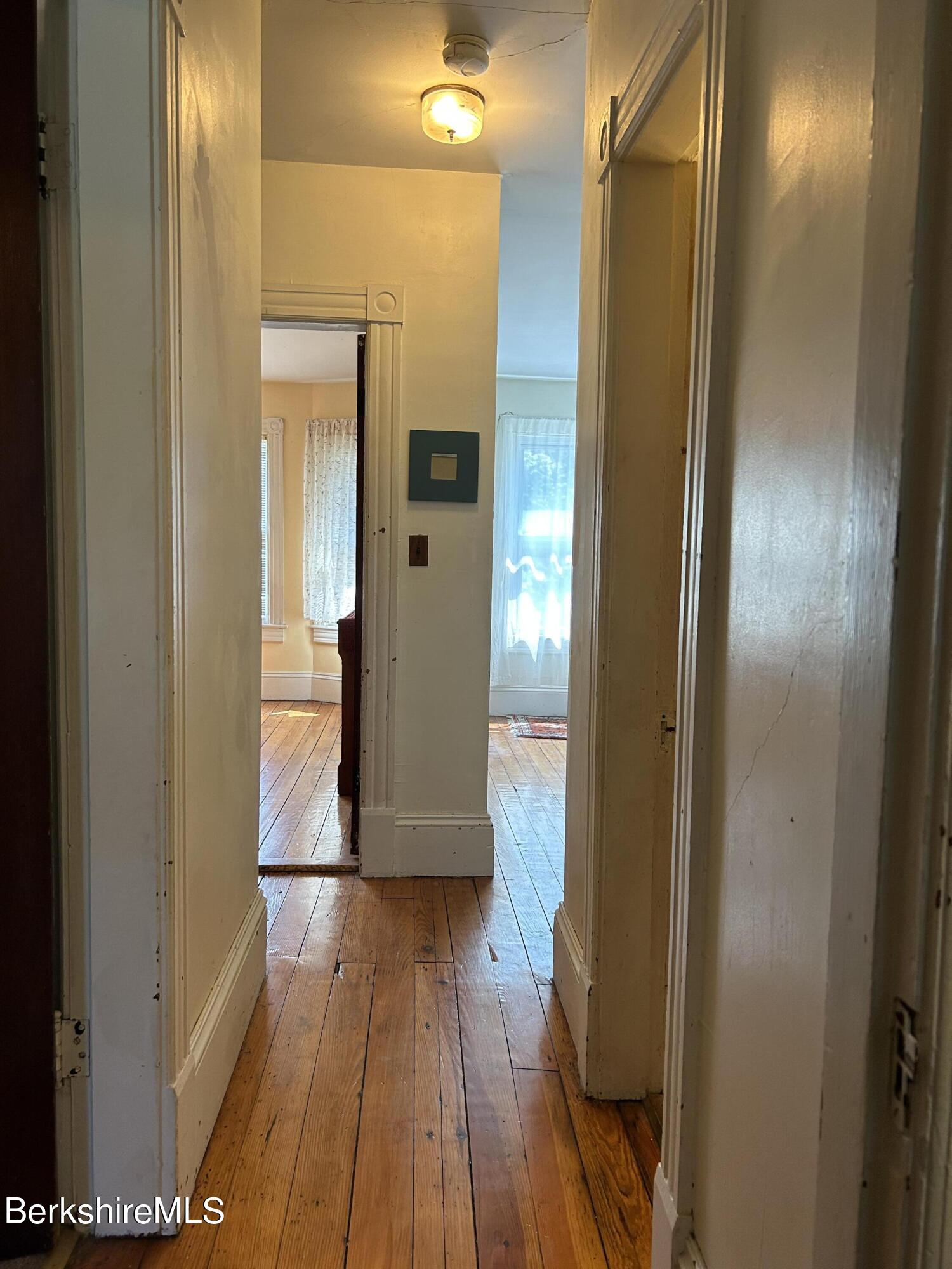 46 Summer Street Adams, MA 01220 - Photo 20 of 35 a view of a hallway with wooden floor