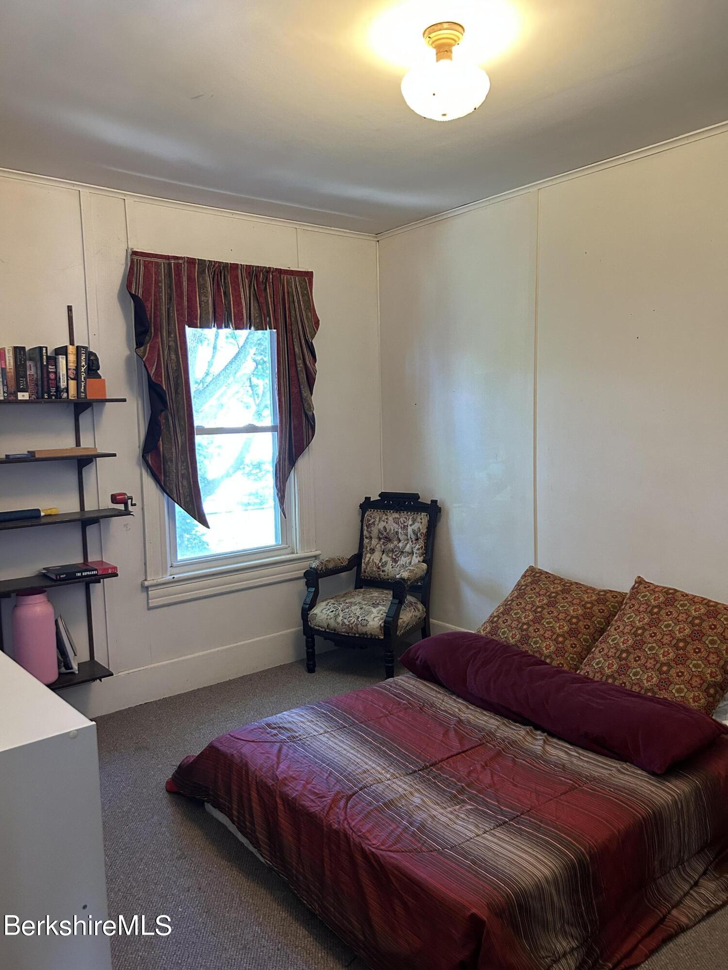 46 Summer Street Adams, MA 01220 - Photo 24 of 35 a bedroom with a bed and a window