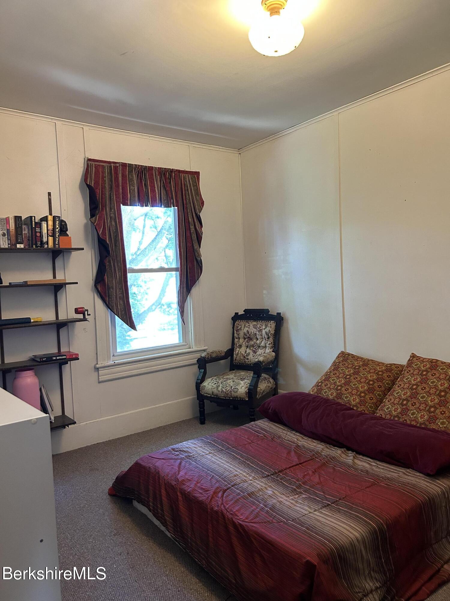 46 Summer Street Adams, MA 01220 - Photo 25 of 35 a bedroom with a bed and a window